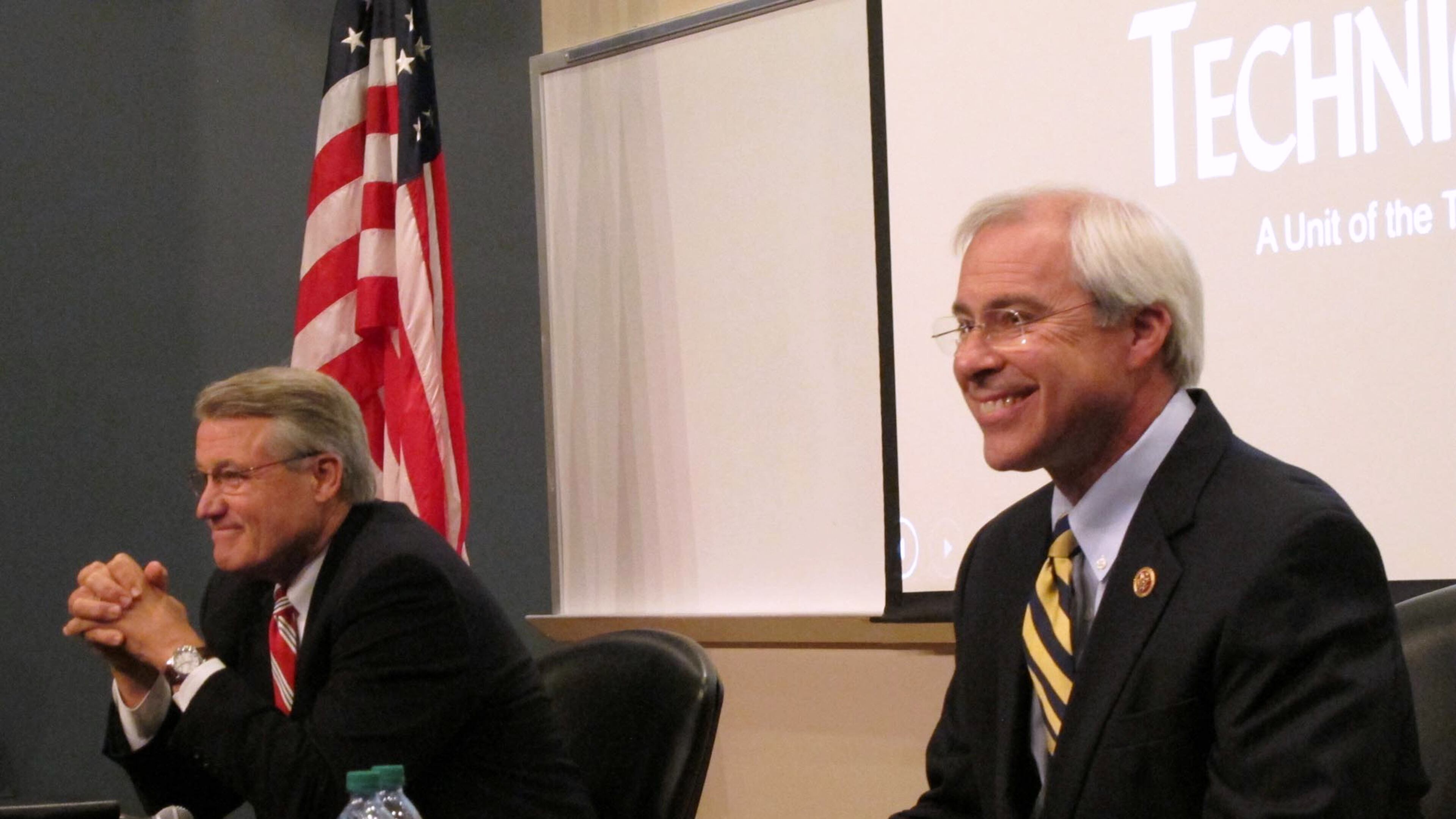 FILE - In this Oct. 16, 2014 file photo Georgia Republican Congressional candidate Rick Allen, left, and Rep. John Barrow, D-Ga. wait for their debate to begin in Statesboro, Ga. How high can Republicans go Tuesday night in padding their House majority? The GOP currently holds 233 of 435 seats _ 234 if you count former Majority Leader Eric Cantors open Virginia seat that is expected to remain in the Republican column. (AP Photo/Russ Bynum, File)