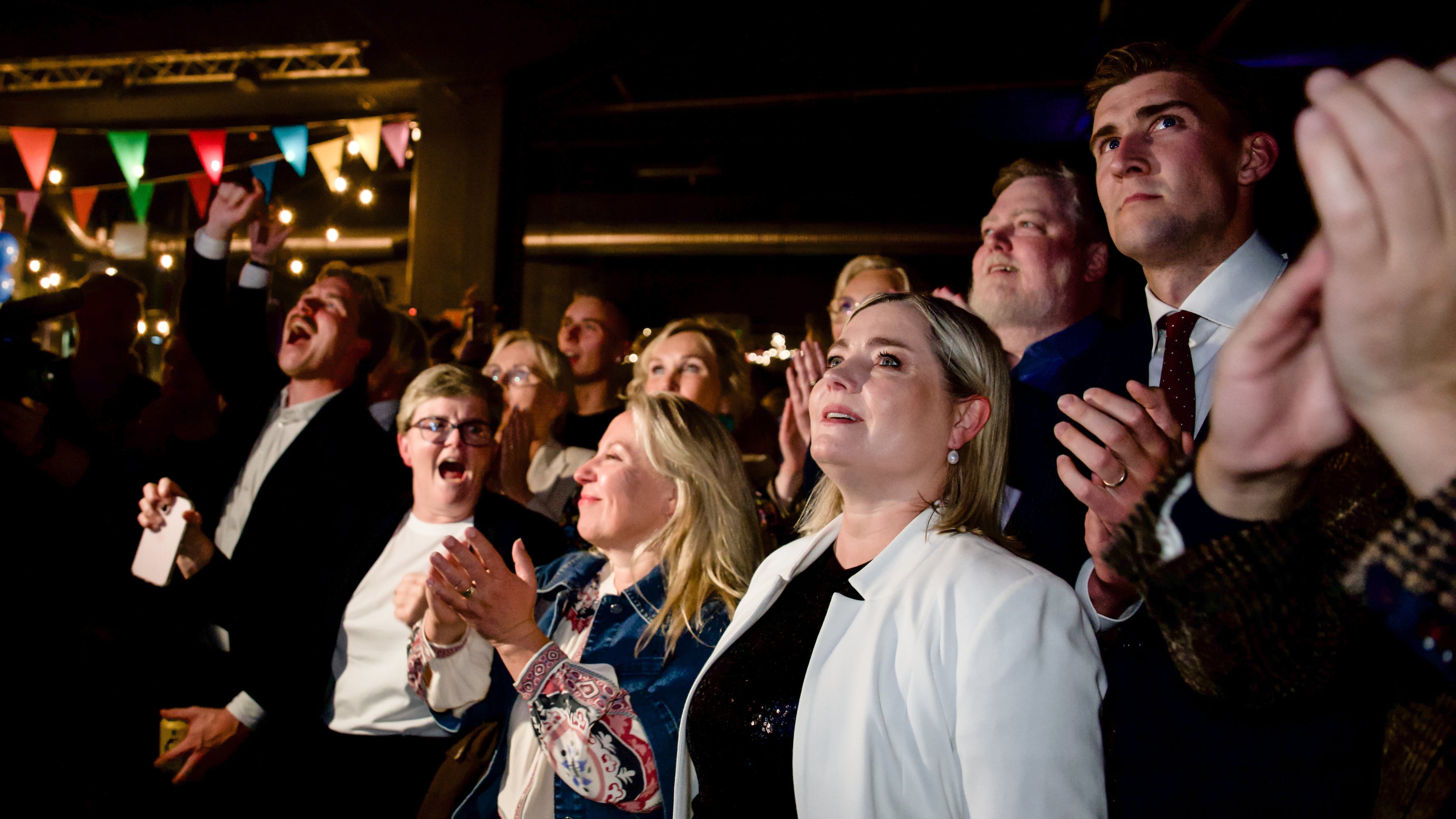 Leaders of the No campaign react as early results from rural Iceland put the No side ahead during an election-night gathering in Reykjavik, Iceland, Saturday, Aug. 29, 2026. (AP Photo/Marco Di Marco)