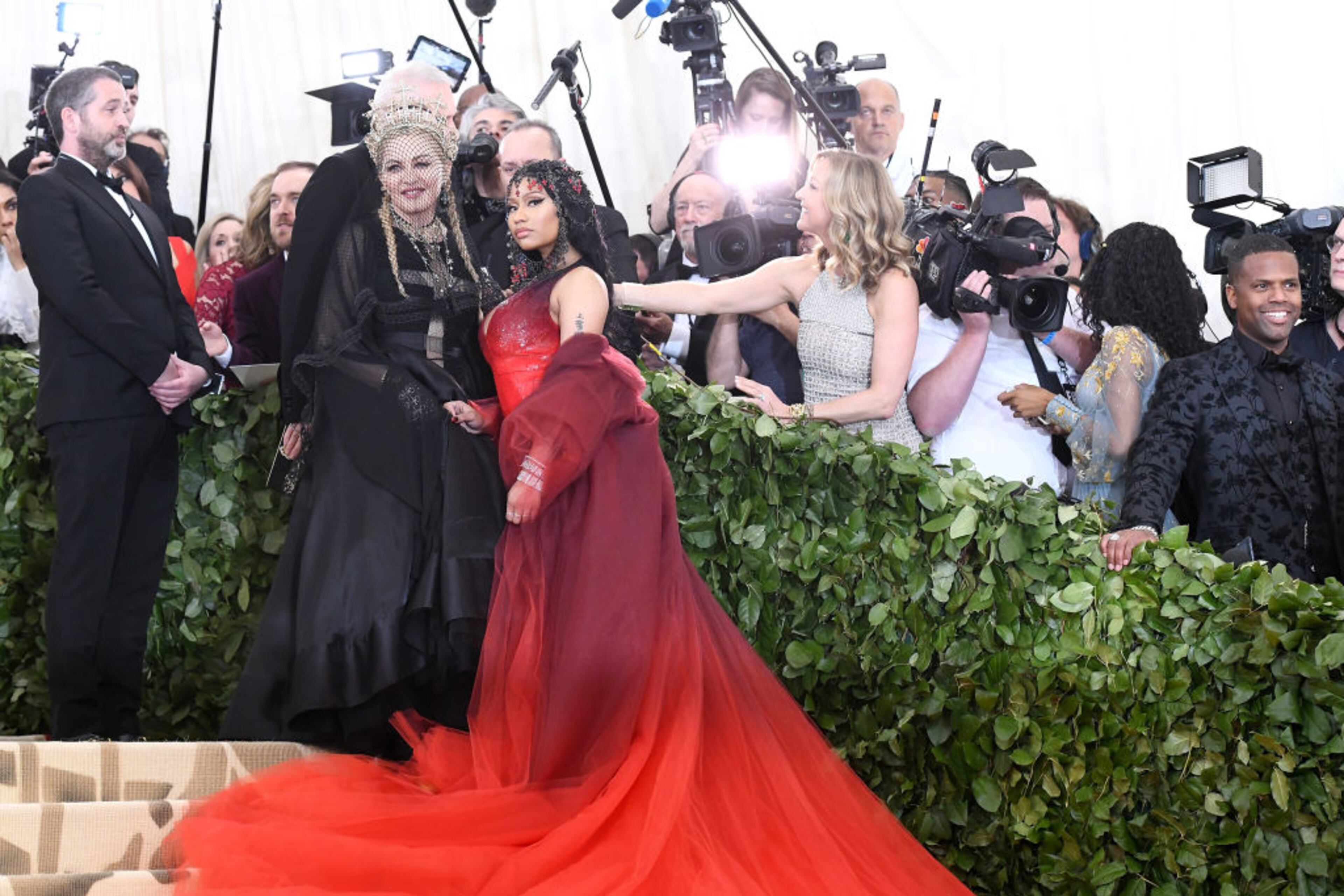 NEW YORK, NY - MAY 07: Recording artists Madonna and Nicki Minaj attend the Heavenly Bodies: Fashion & The Catholic Imagination Costume Institute Gala at The Metropolitan Museum of Art on May 7, 2018 in New York City. (Photo by Noam Galai/Getty Images for New York Magazine)