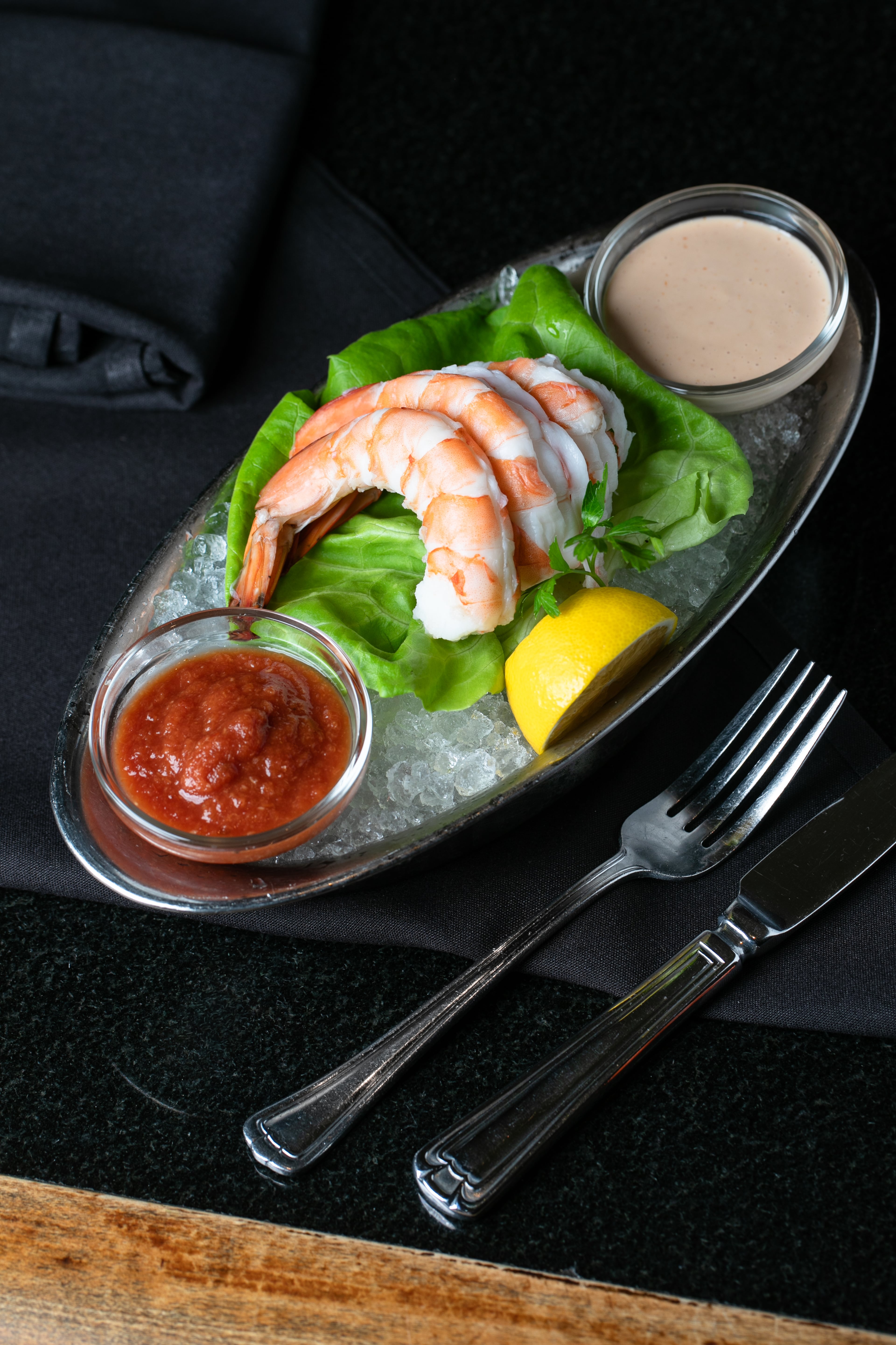 Jumbo shrimp cocktail at McKendrick's is served with three shrimp. (Erik Meadows Photography/Courtesy of McKendrick's Steakhouse & Bar)