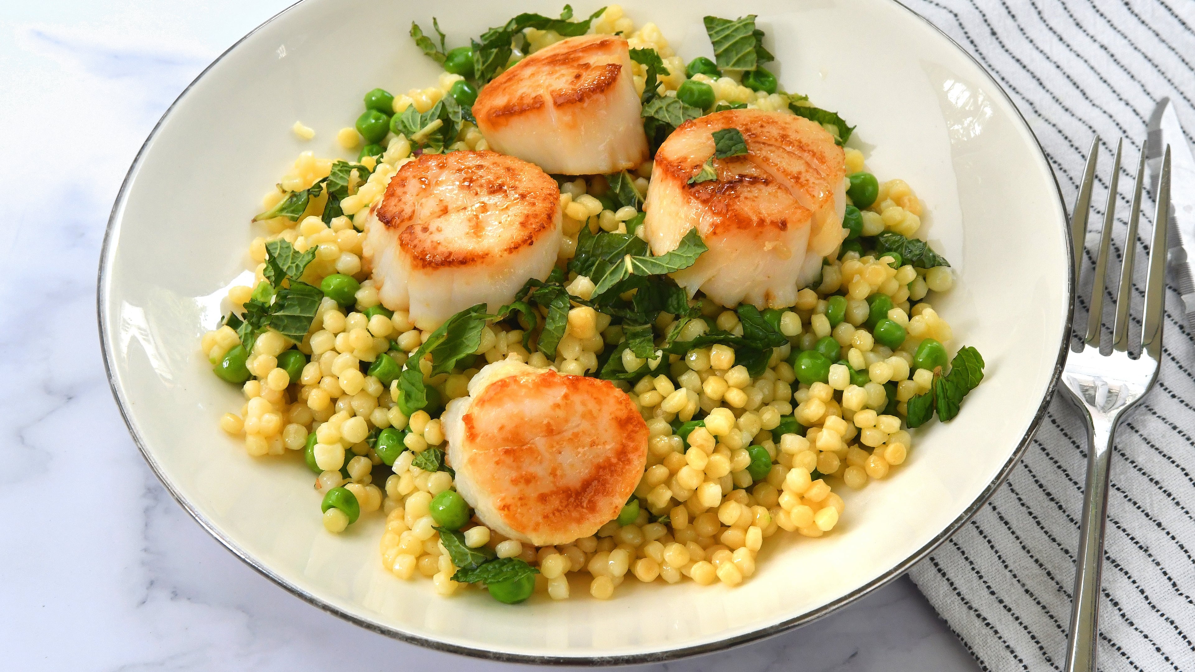 Seared Scallops with Minty Peas and Couscous.
Chris Hunt for The Atlanta Journal-Constitution