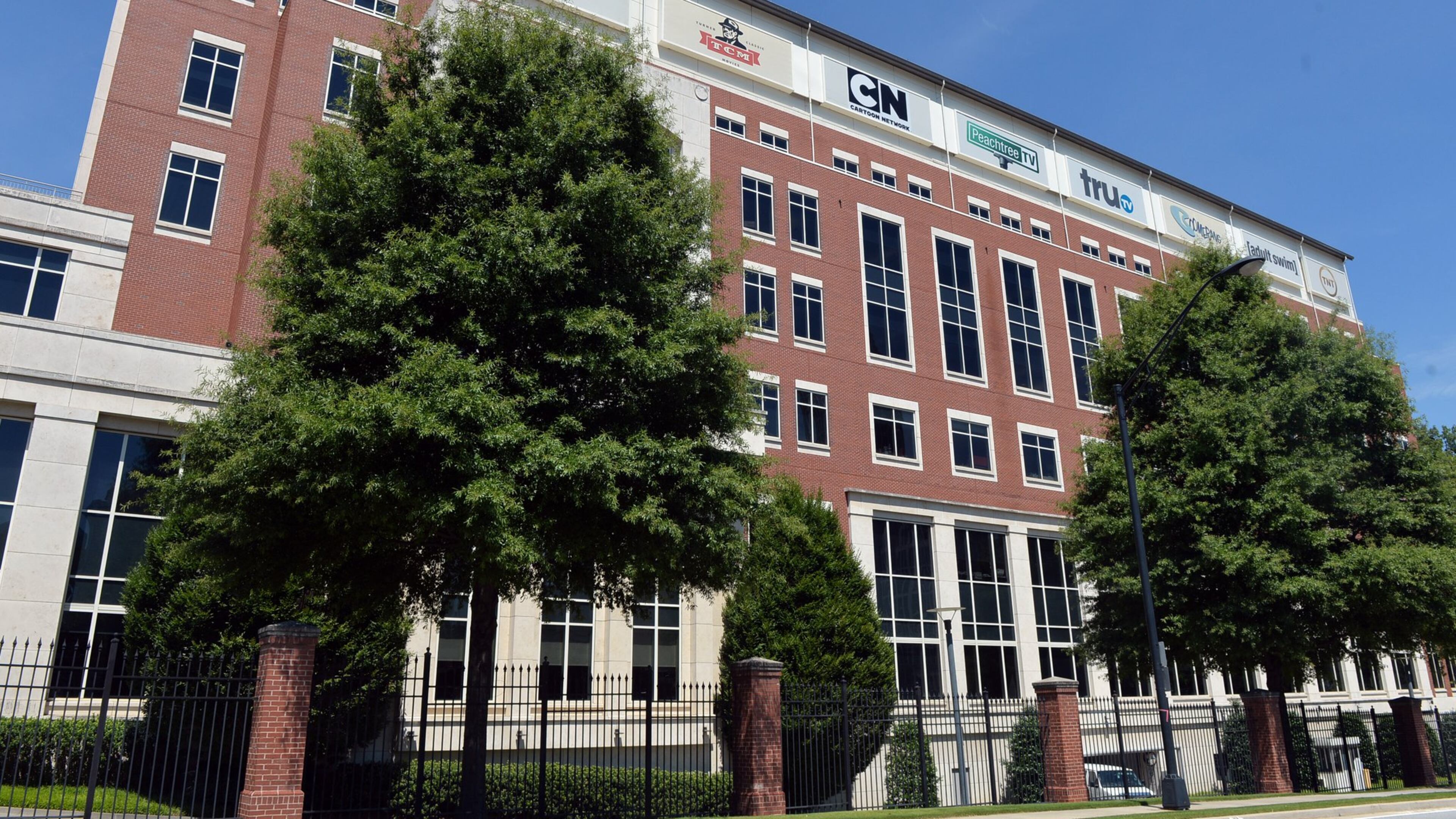 A building at Turner’s campus in Midtown Atlanta. Now owned by New York-based Time Warner, Turner properties would become part of AT&T under a proposed deal. KDJOHNSON/KDJOHNSON@AJC.COM