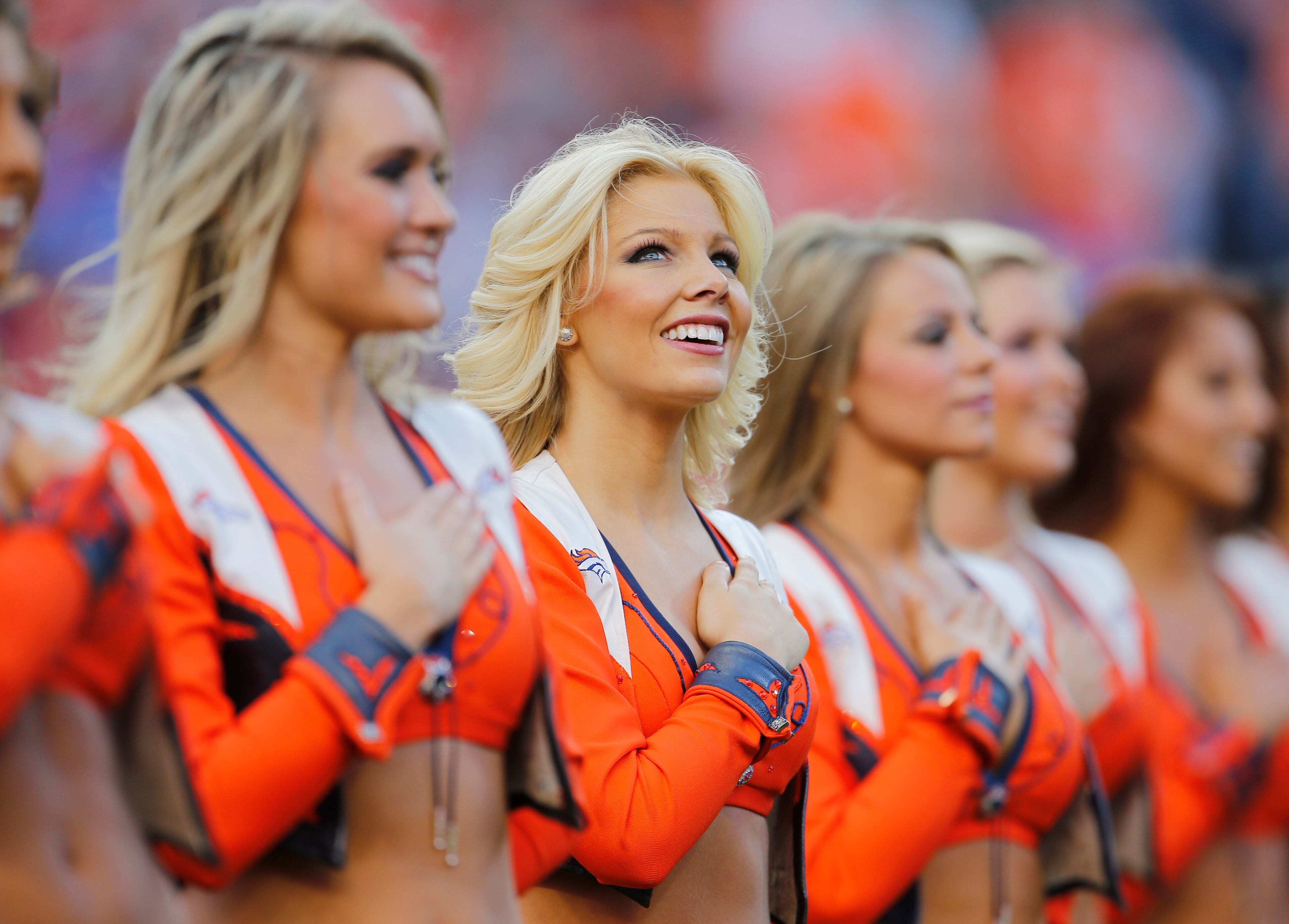 The Denver Broncos cheerleaders line up prior to an NFL football game against the Indianapolis Colts, Sunday, Sept. 7, 2014, in Denver. (AP Photo/Joe Mahoney)