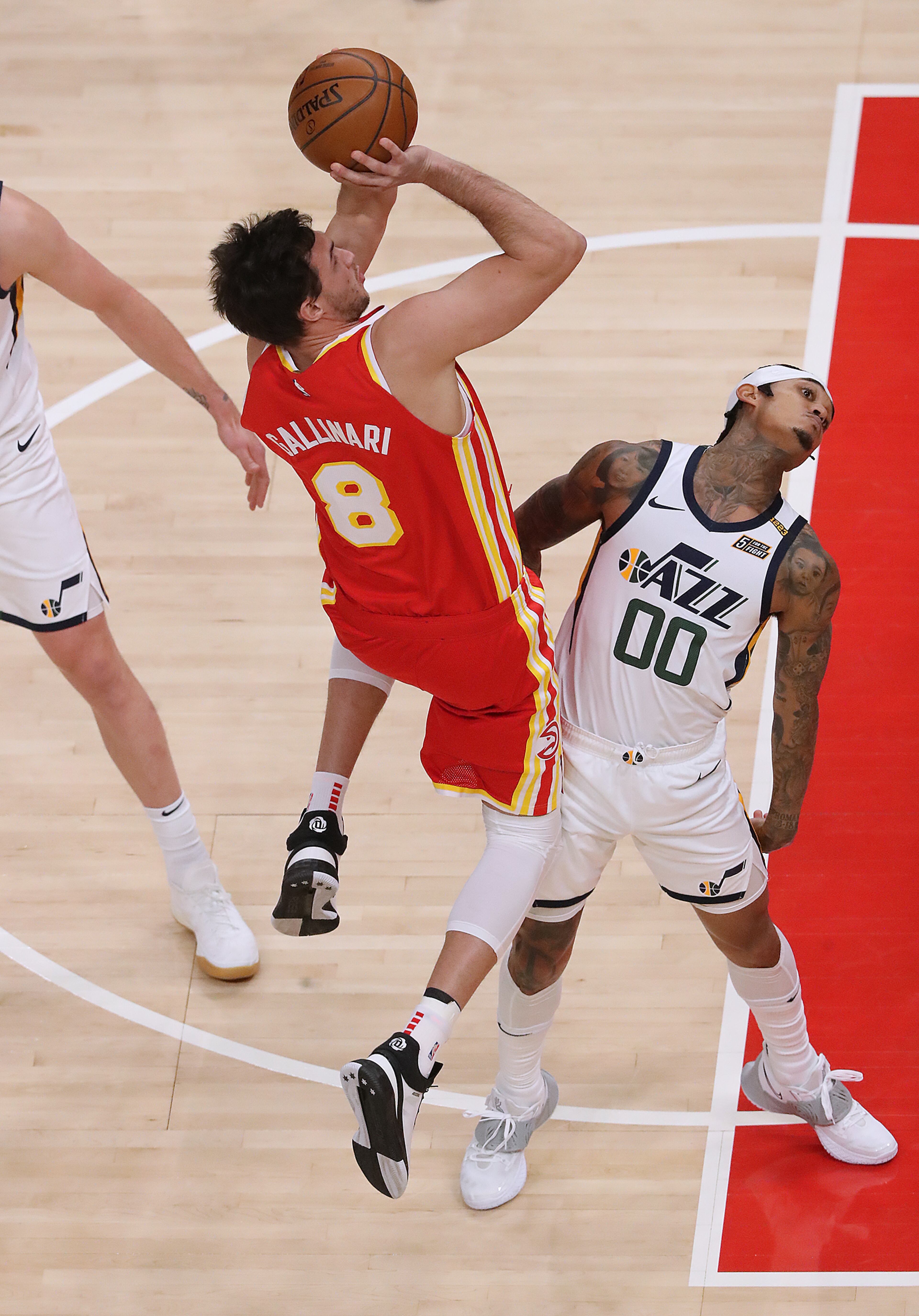 Atlanta Hawks forward Danilo Gallinari shoots over Utah Jazz guard Jordan Clarkson in an NBA basketball game on Thursday, Feb 4, 2021, in Atlanta. Curtis Compton / Curtis.Compton@ajc.com”