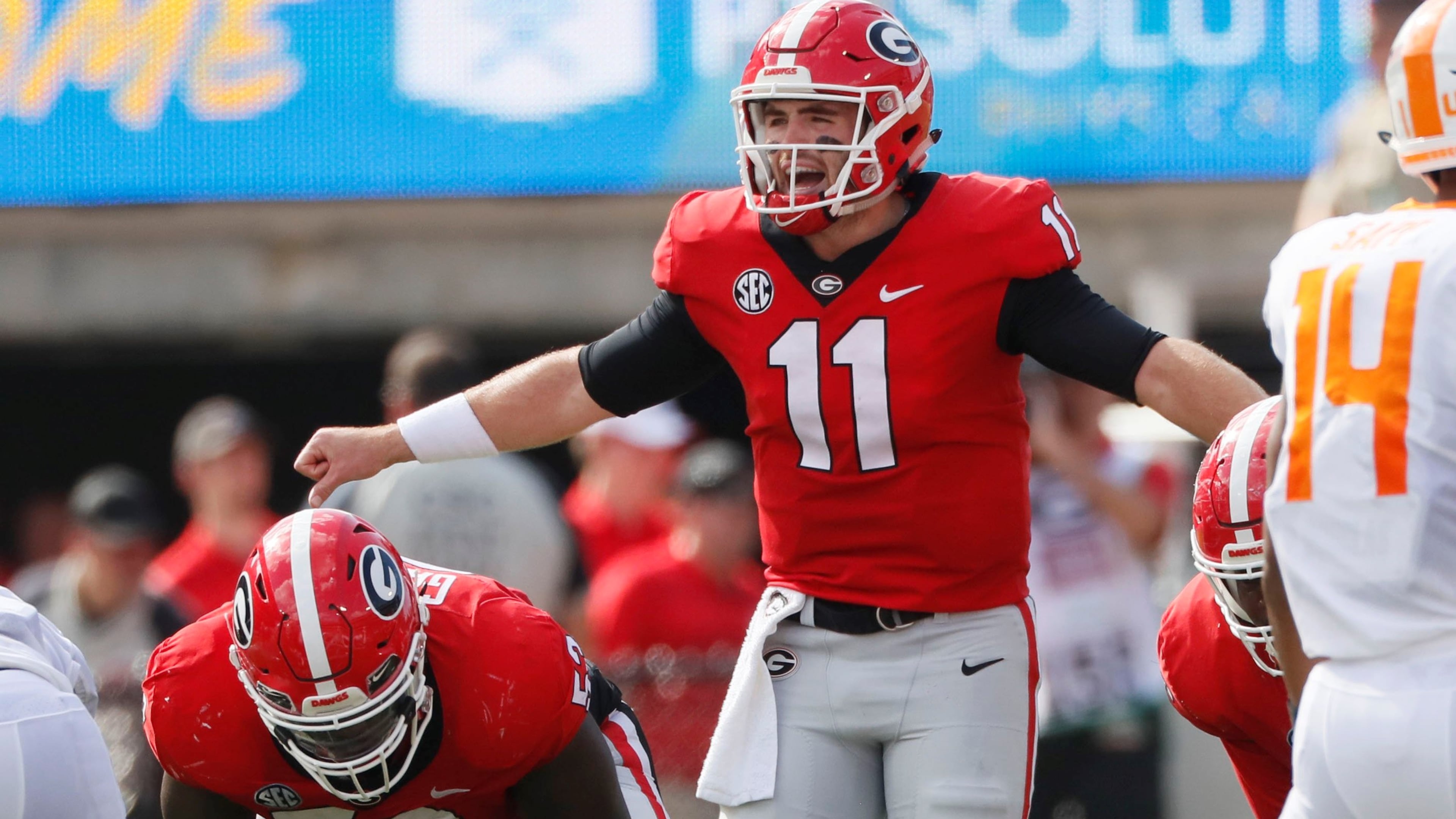 Georgia Bulldogs quarterback Jake Fromm (11) directs the offense in the first half behind Georgia Bulldogs center Lamont Gaillard (53). The University of Georgia Bulldogs played the Tennessee Volunteers in a NCAA college football game Saturday, Sept 29, 2018, at Sanford Stadium in Athens, GA. BOB ANDRES /BANDRES@AJC.COM