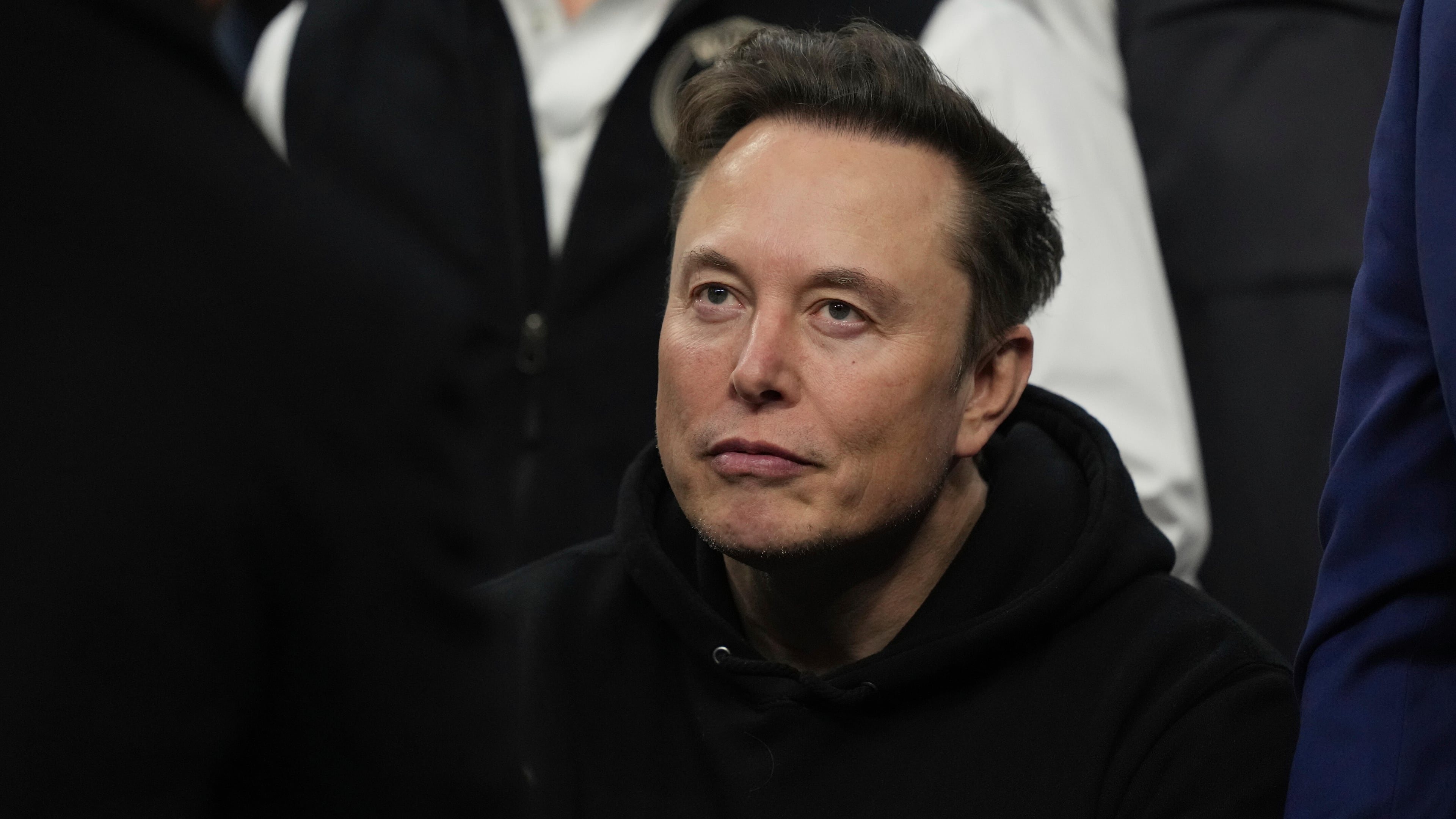 FILE - Elon Musk attends the finals for the NCAA wrestling championship, March 22, 2025, in Philadelphia. (AP Photo/Matt Rourke, File)