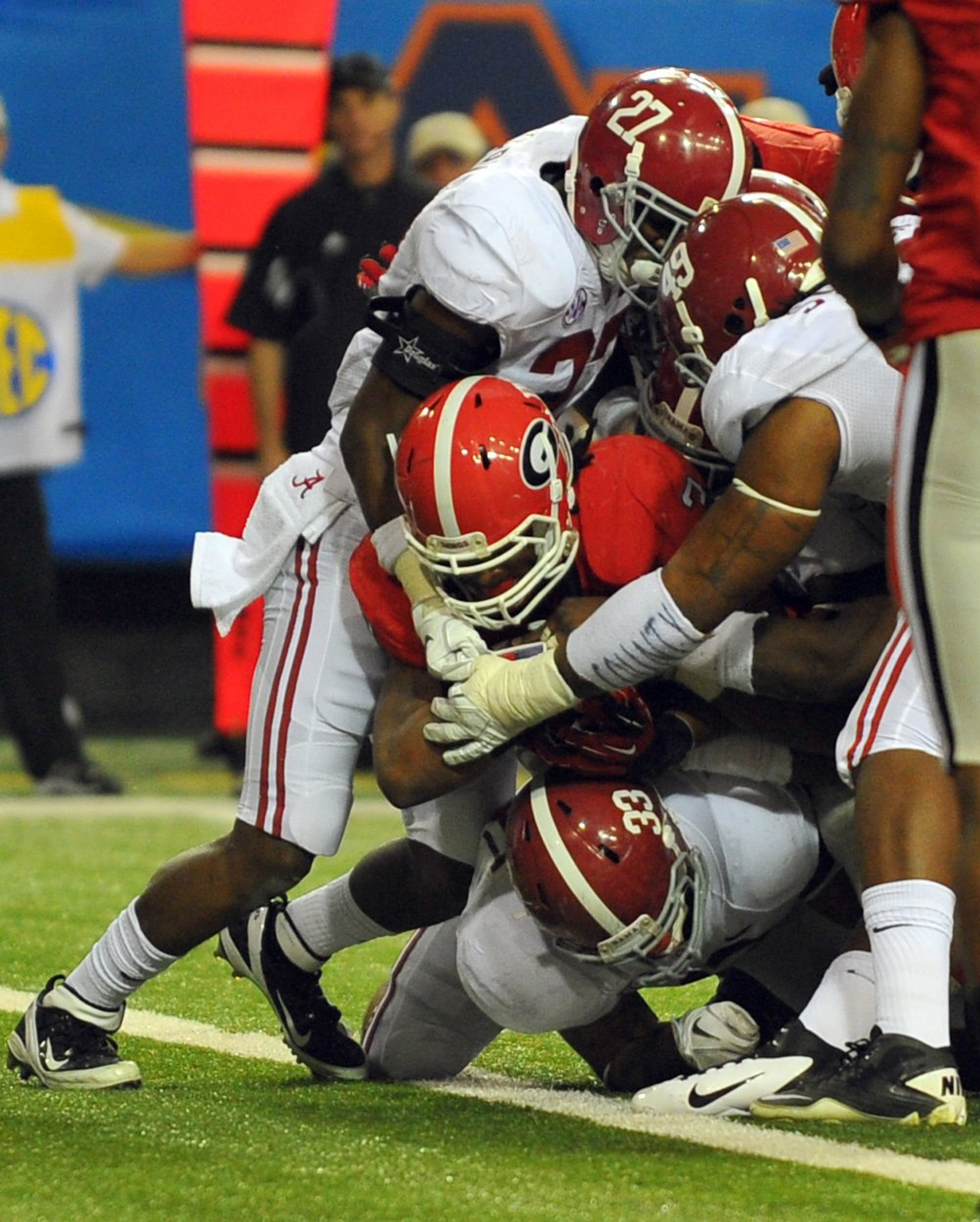 Georgia running back Todd Gurley pushes his way into the end zone for a third-quarter touchdown, giving the Bulldogs a 14-10 lead over Alabama Saturday afternoon, Dec. 1, 2012 during the SEC Championship game at the Georgia Dome.
