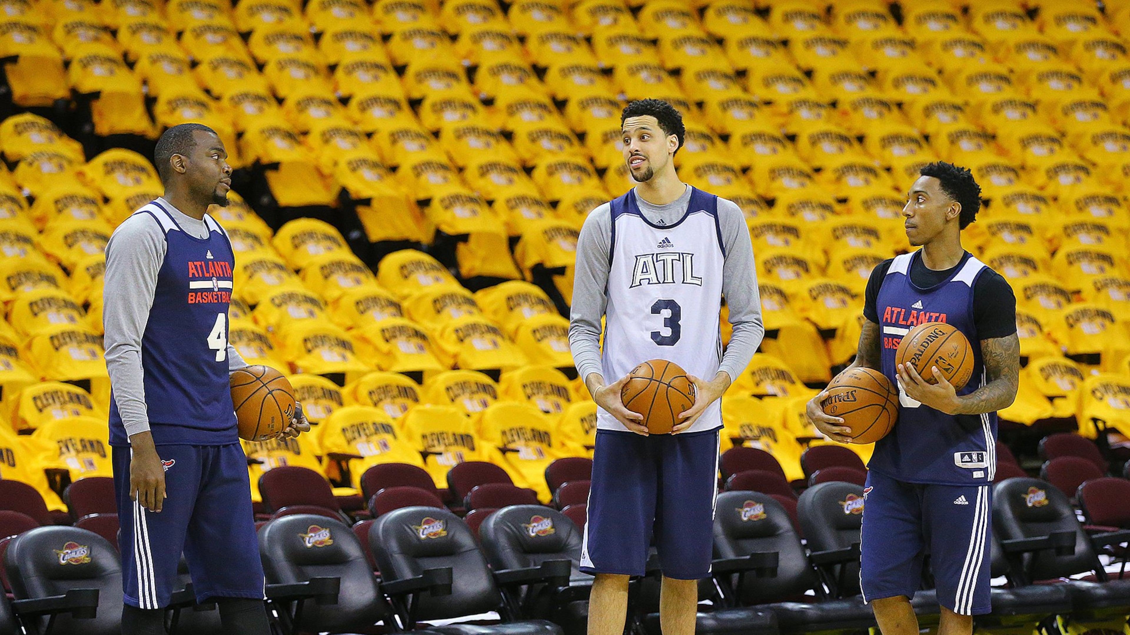 Hawks Paul Millsap (from left), Austin Daye and Jeff Teague participate in team shoot around at Quicken Loans Arena in preparation for game 4 against the Cavaliers in the Eastern Conference Finals on Tuesday, May 26, 2015, in Cleveland. Curtis Compton / ccompton@ajc.com