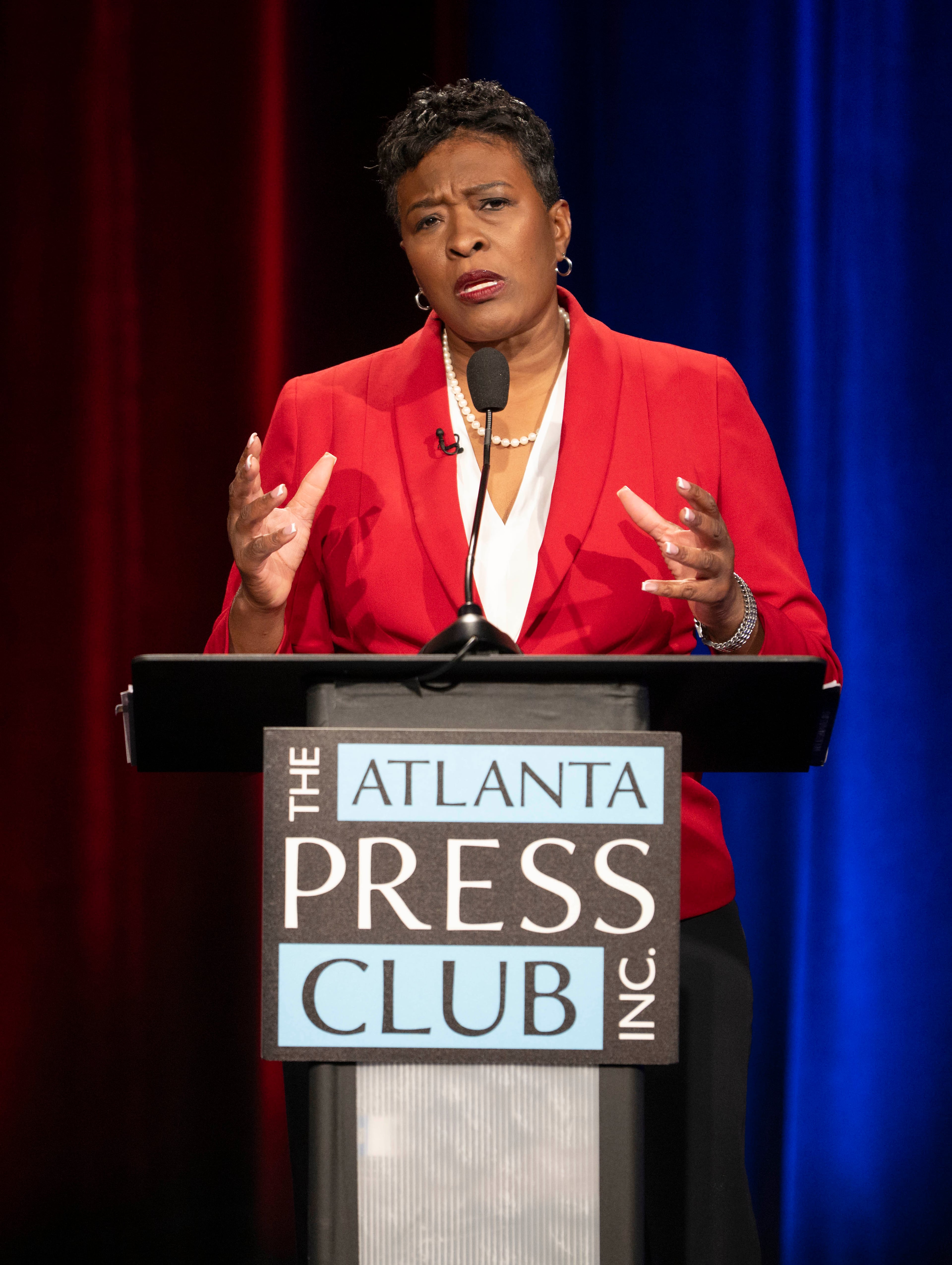 The Democratic candidate for Georgia Insurance Commissioner, Keisha Sean Waites, debates incumbent Republican commissioner, John King (not shown) at the Atlanta Press Club's Loudermilk-Young Debate Series held Tuesday, Oct. 13, at the studios of Georgia Public Broadcasting. (Pool photo by Brian Cahn)