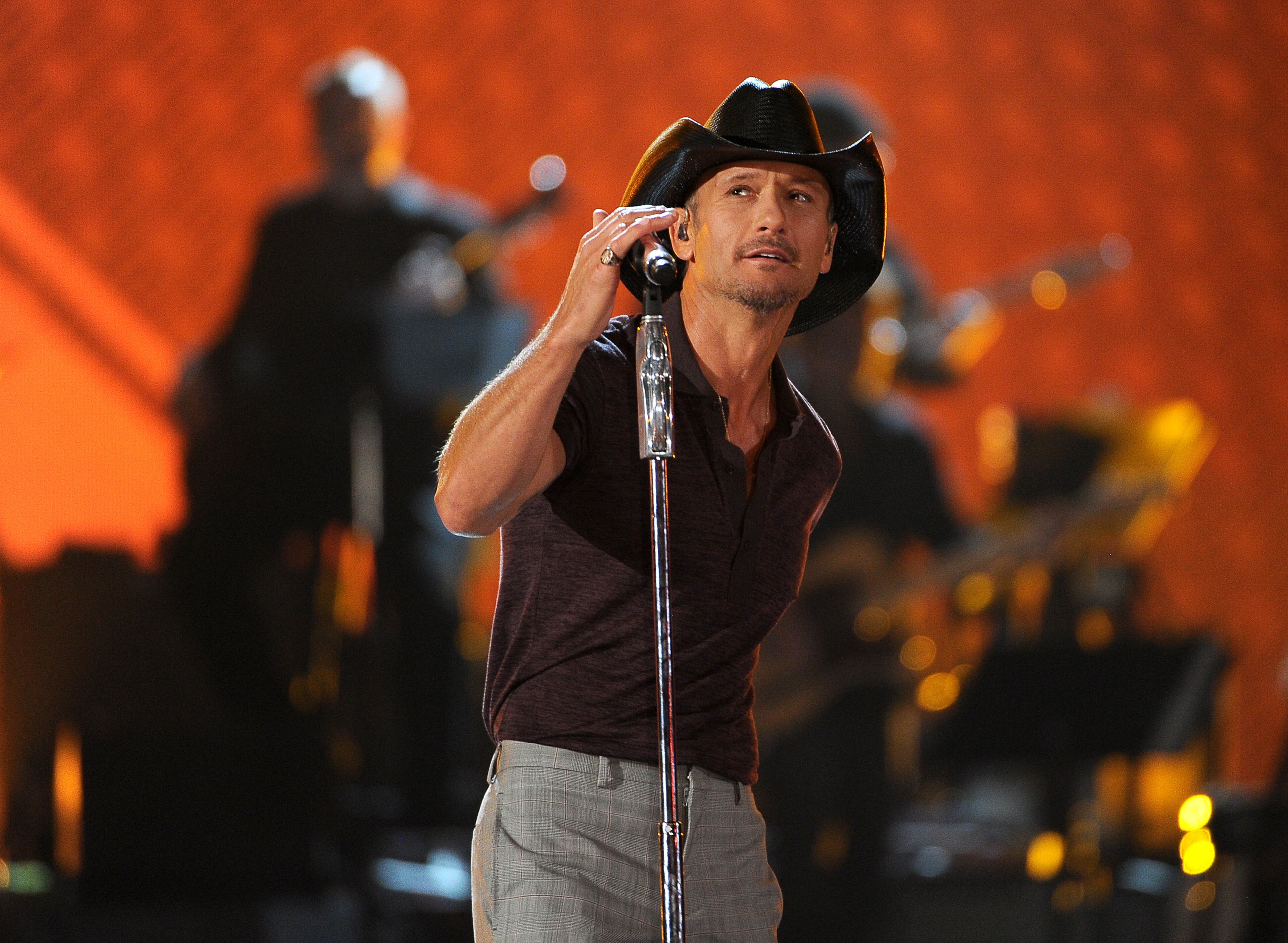 Tim McGraw performs at ACM Presents an All-Star Salute to the Troops on Monday, April 7, 2014, in Las Vegas. (Photo by Chris Pizzello/Invision/AP)