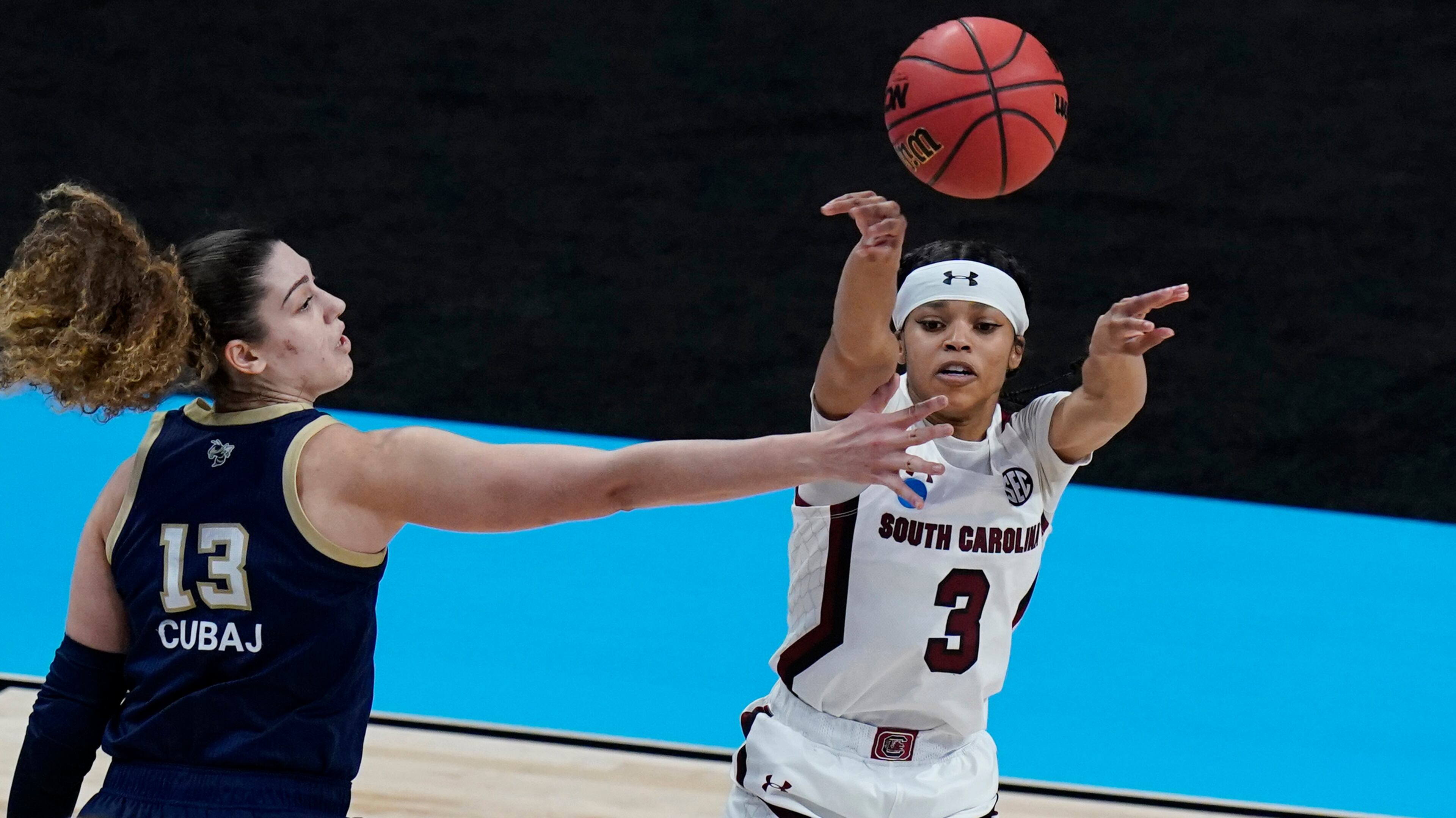 South Carolina guard Destanni Henderson (3) passes the ball around Georgia Tech forward Lorela Cubaj (13) during the Sweet Sixteen round of the women's NCAA Tournament Sunday, March 28, 2021, at the Alamodome in San Antonio. (Eric Gay/AP)