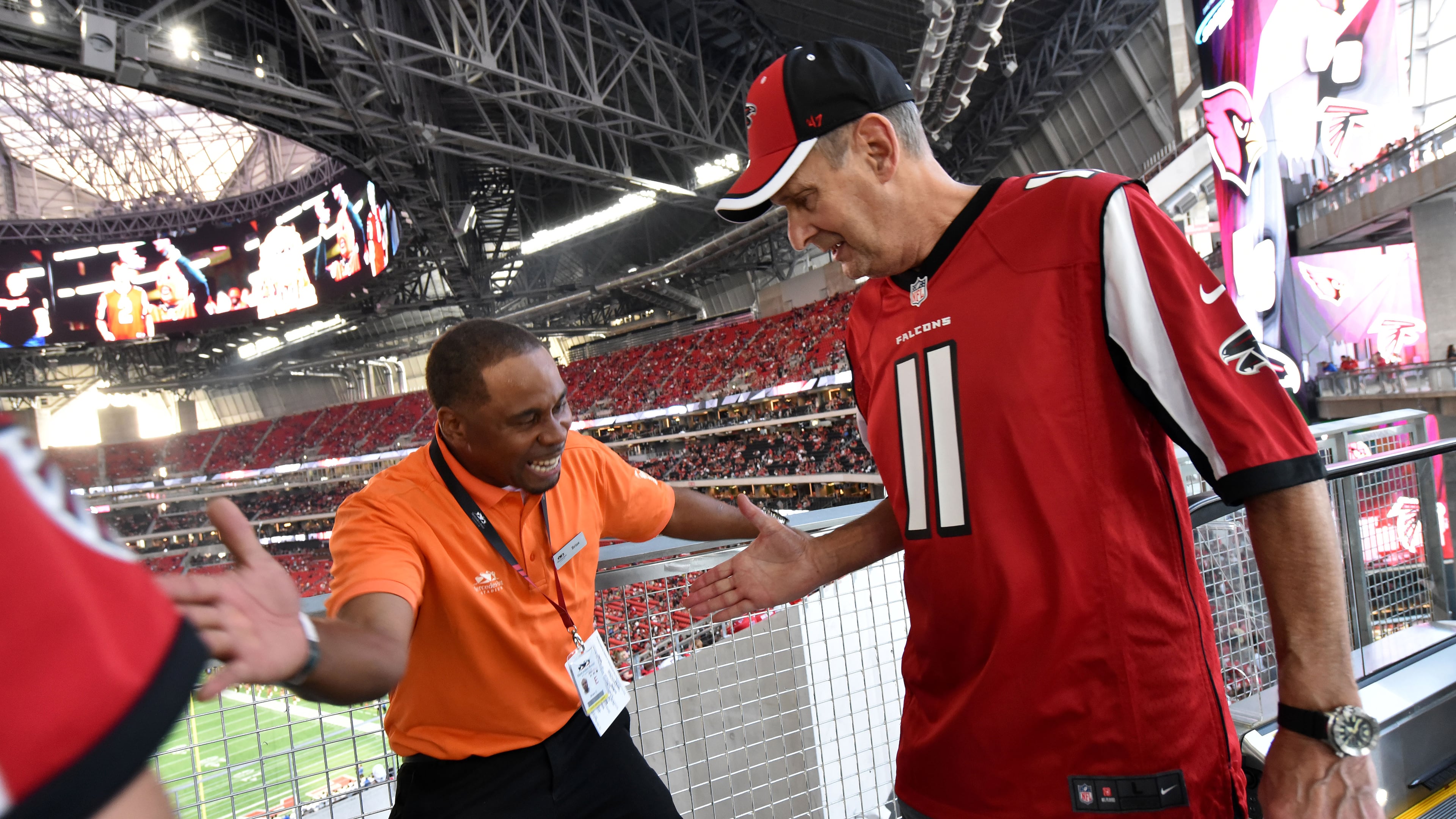 August 26, 2017 Atlanta - Brian Cooper greets Atlanta Falcons fans before an exhibition game against the Arizona Cardinals at new Mercedes-Benz Stadium on Saturday, August 26, 2017. HYOSUB SHIN / HSHIN@AJC.COM