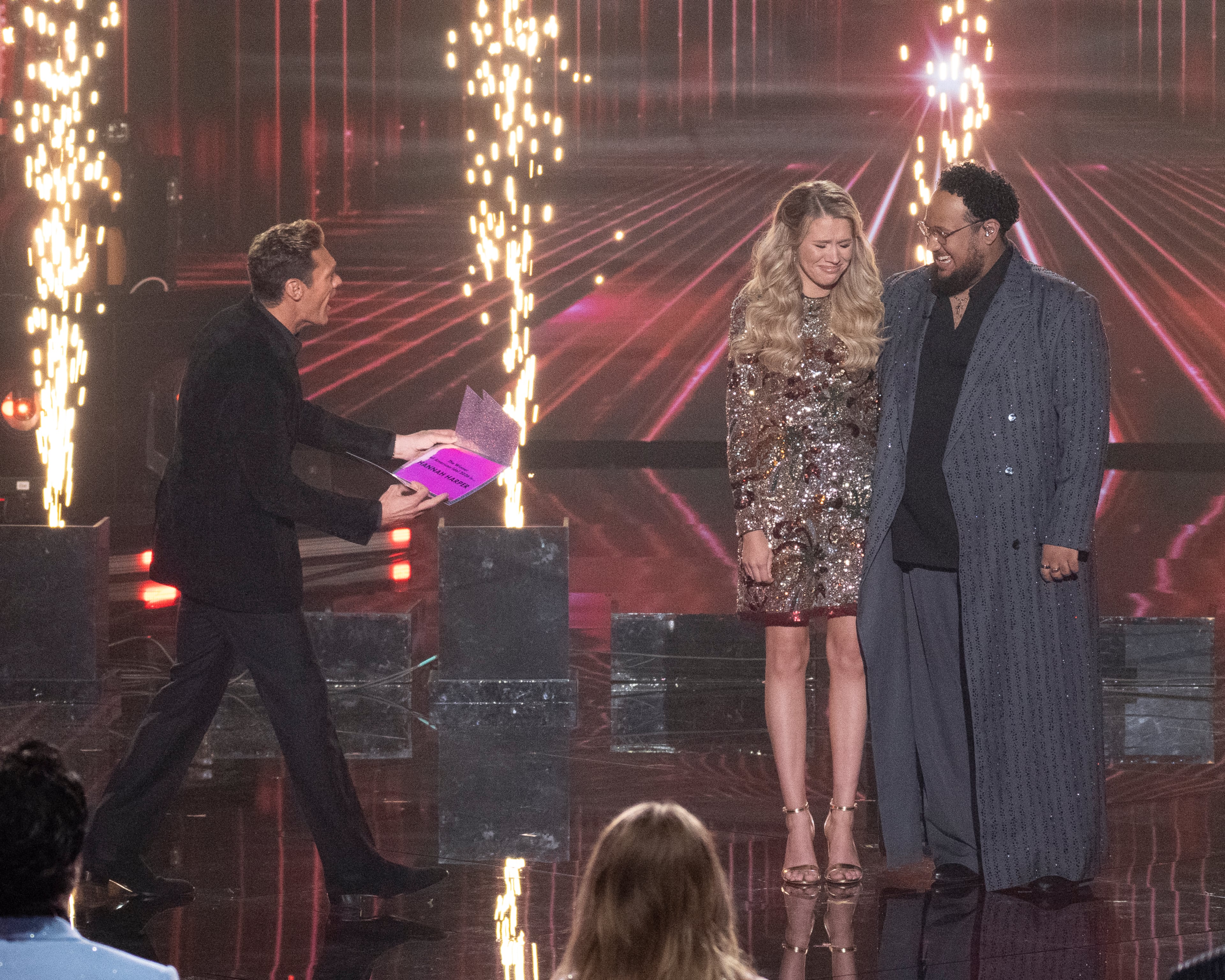 During the final episode of Season 24 of "American Idol" in May 2026, Ryan Seacrest announces Hannah Harper as the winner over runner-up Jordan McCullough. (Eric McCandless/Courtesy of Disney)