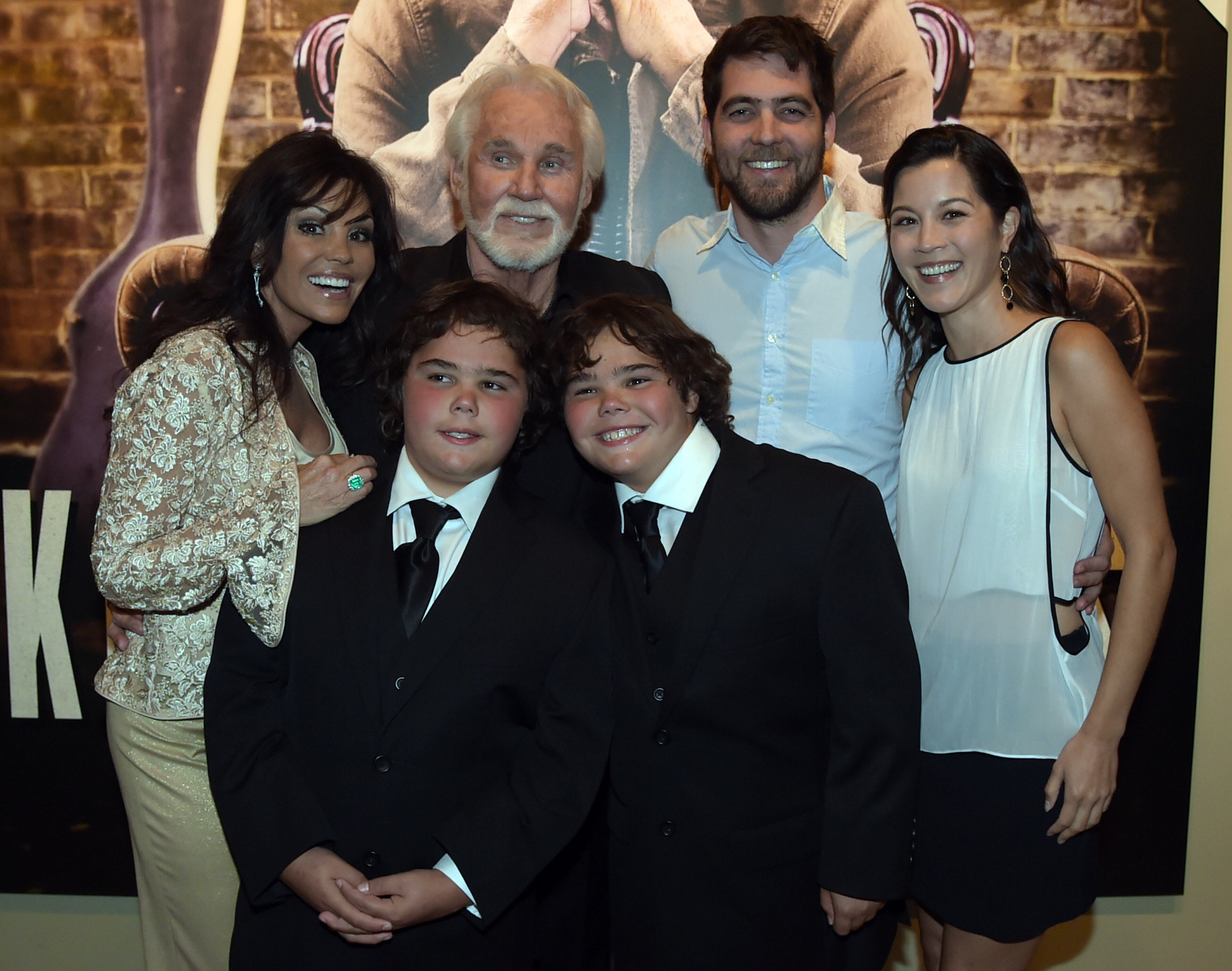 NASHVILLE, TN - AUGUST 13: Country Music Hall of Fame member Kenny Rogers and his family attend the Country Music Hall of Fame Kenny Rogers Exhibit Opening Reception at the Country Music Hall of Fame and Museum on August 13, 2014 in Nashville, Tennessee. (Photo by Rick Diamond/Getty Images for the Country Music Hall of Fame and Museum)