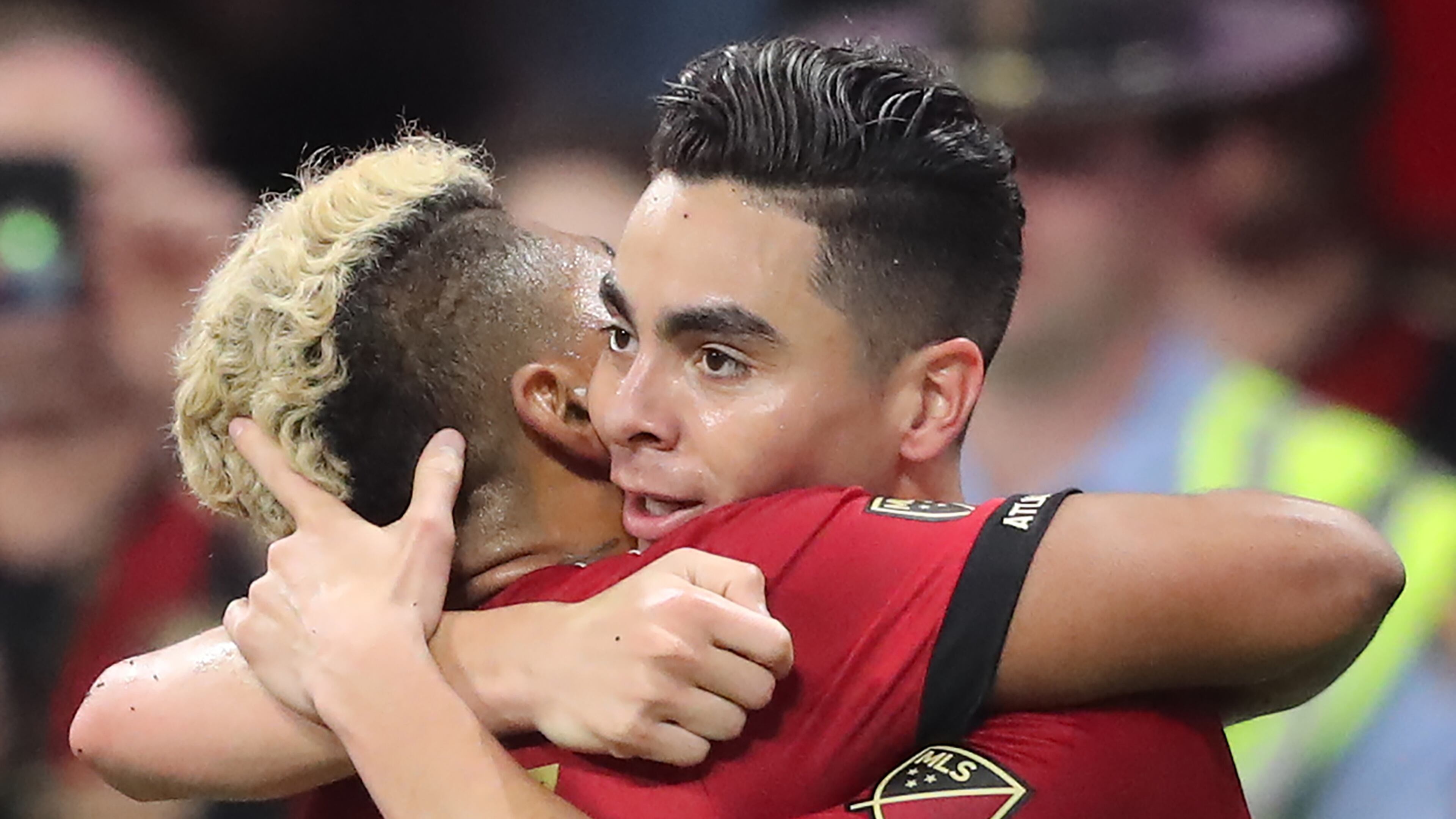 March 11, 2018 Atlanta: Atlanta United midfielder Miguel Almiron and forward Josef Martinez celebrate Almironâs goal against D.C. United for a 2-0 lead during the second half in a MLS soccer match on Sunday, March 11, 2018, in Atlanta. Martinez scored the first goal of the game on the way to a 3-1 victory in the home opener. Curtis Compton/ccompton@ajc.com