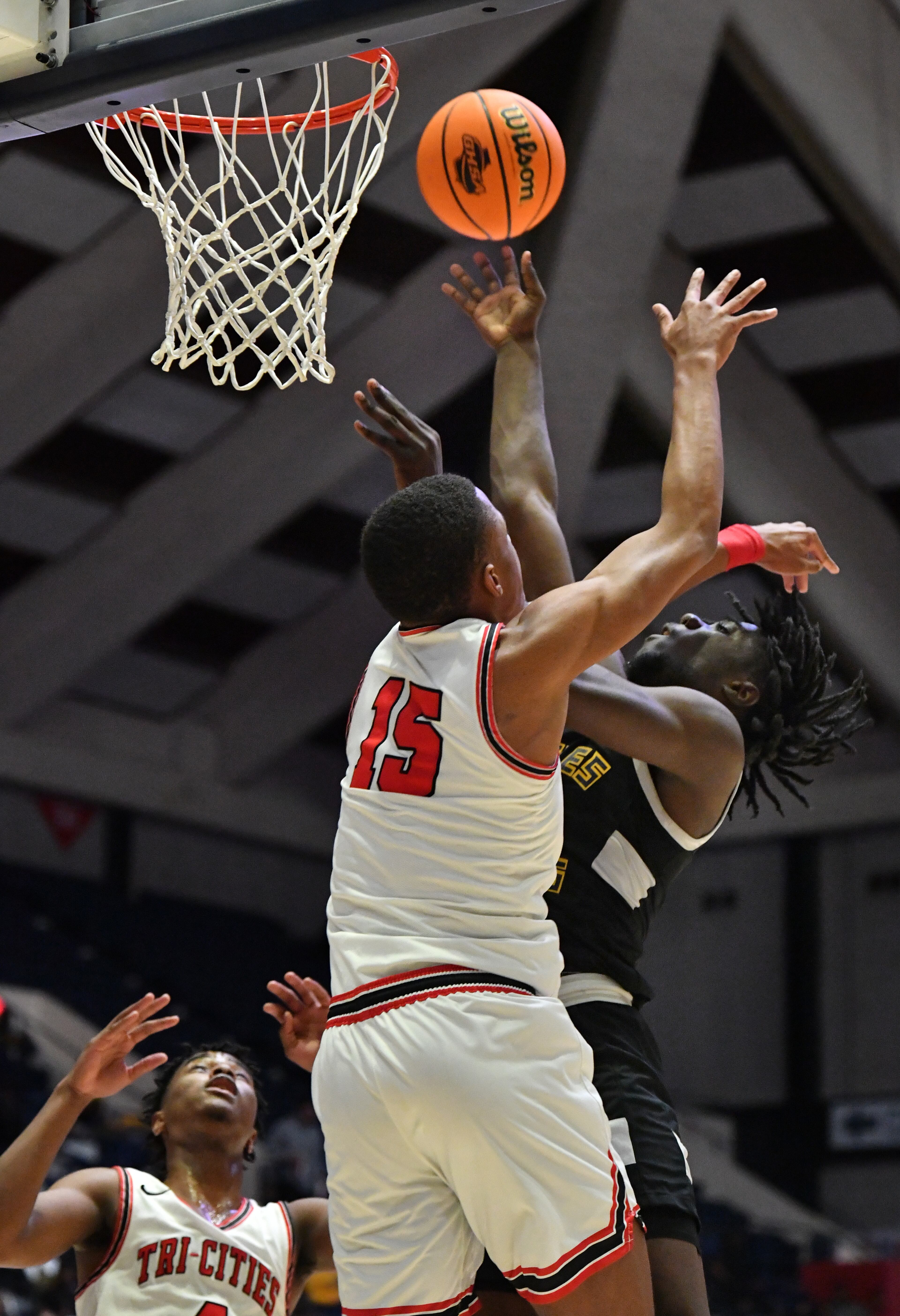 Eagle's Landing's Nick Mason (2) shoots against Tri-Cities' William Norwood (15) during the 2022 GHSA State Basketball Class AAAAA Boys Championship game at the Macon Centreplex in Macon on Thursday, March 10, 2022. (Hyosub Shin / Hyosub.Shin@ajc.com)