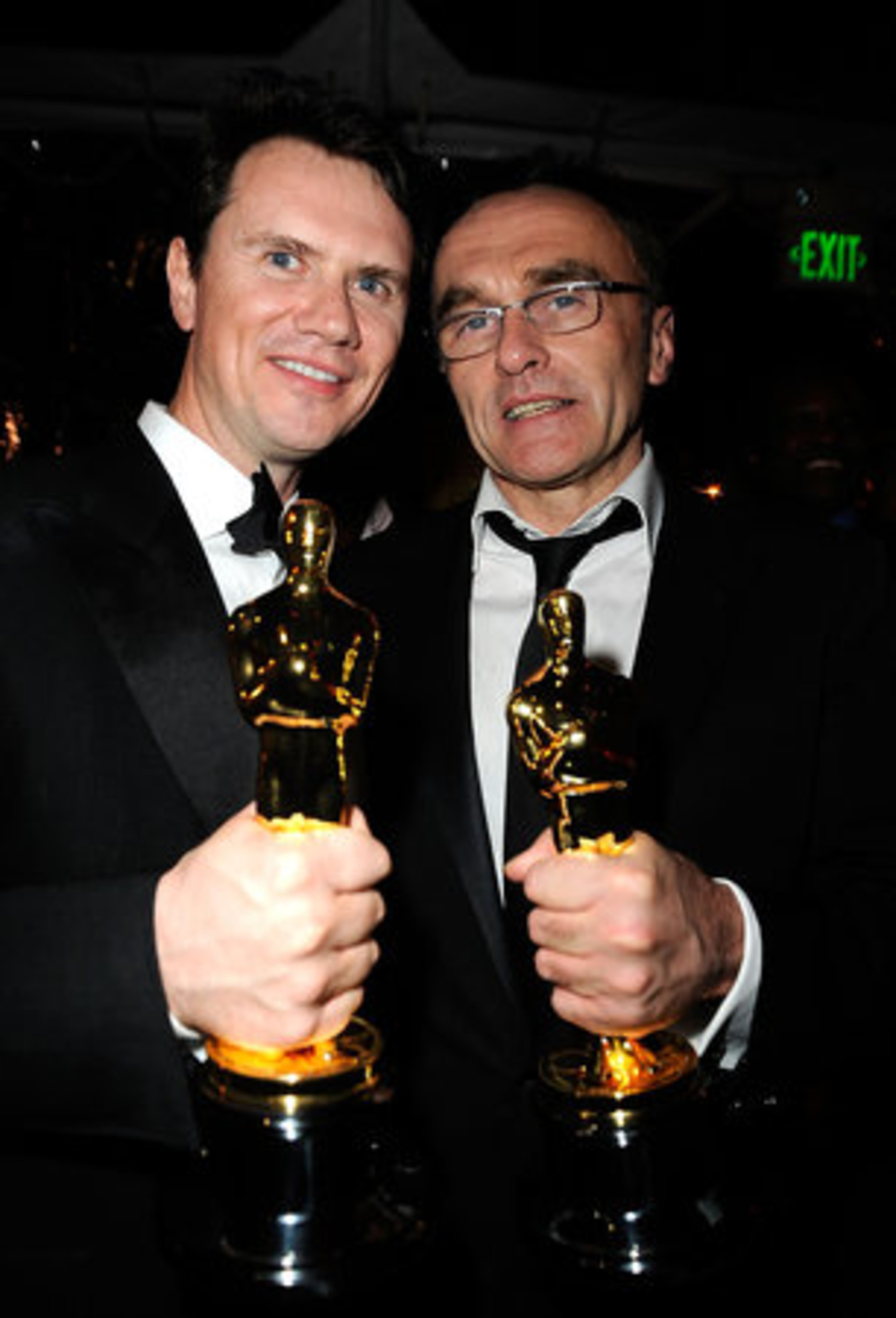 Fox Searchlight Pictures President Peter Rice (left) and director Danny Boyle show off the 'Slumdog Millionaire' hardware at the Fox Searchlight post-Oscars party.