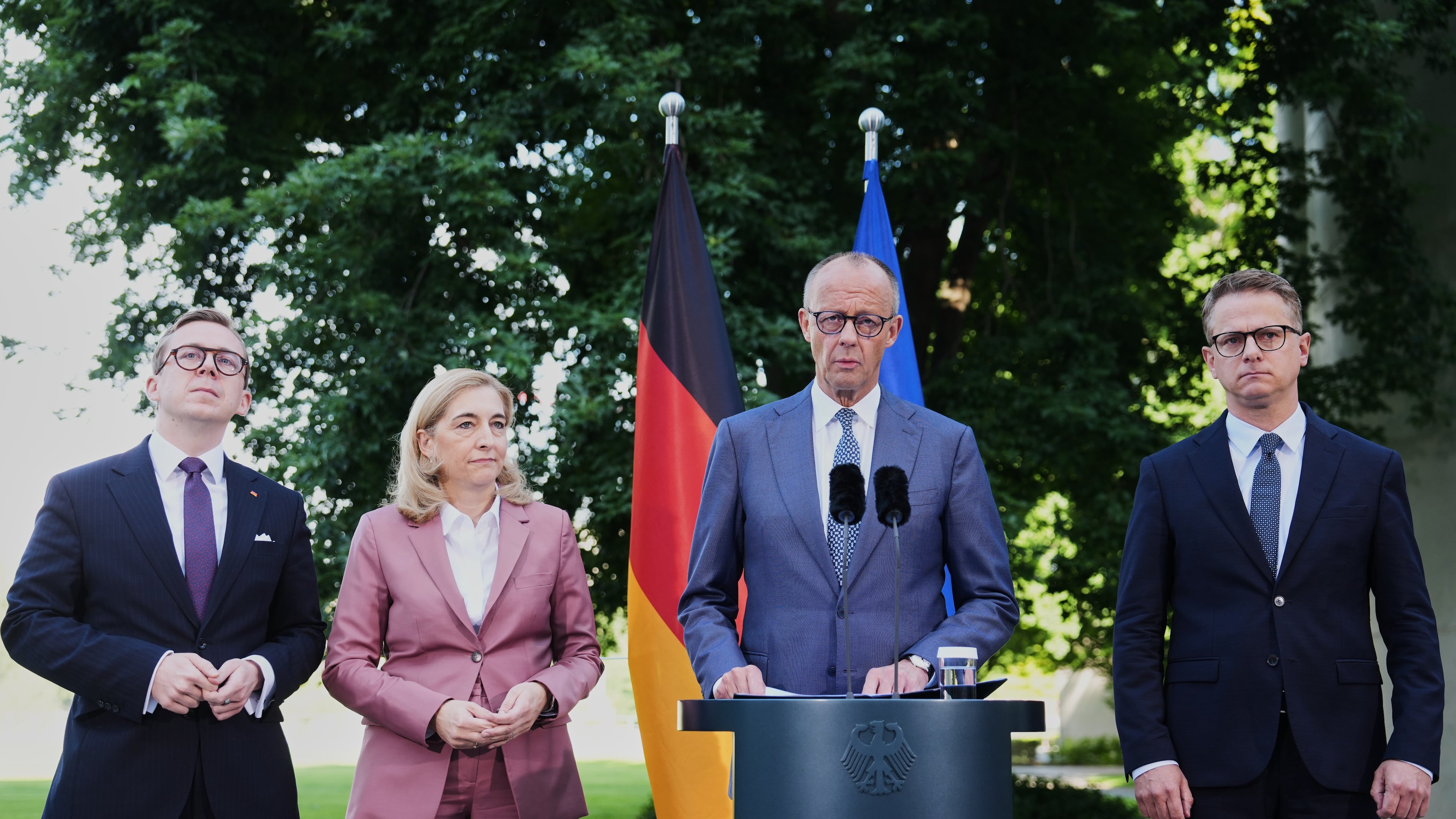 From left: Federal Chancellor Friedrich Merz arrives with Philipp Amthor, Nina Warken and Carsten Linnemann and for statement about planned personnel changes in his government at the chancellery in Berlin, Germany, Friday, July 24, 2026. (AP Photo/Markus Schreiber)