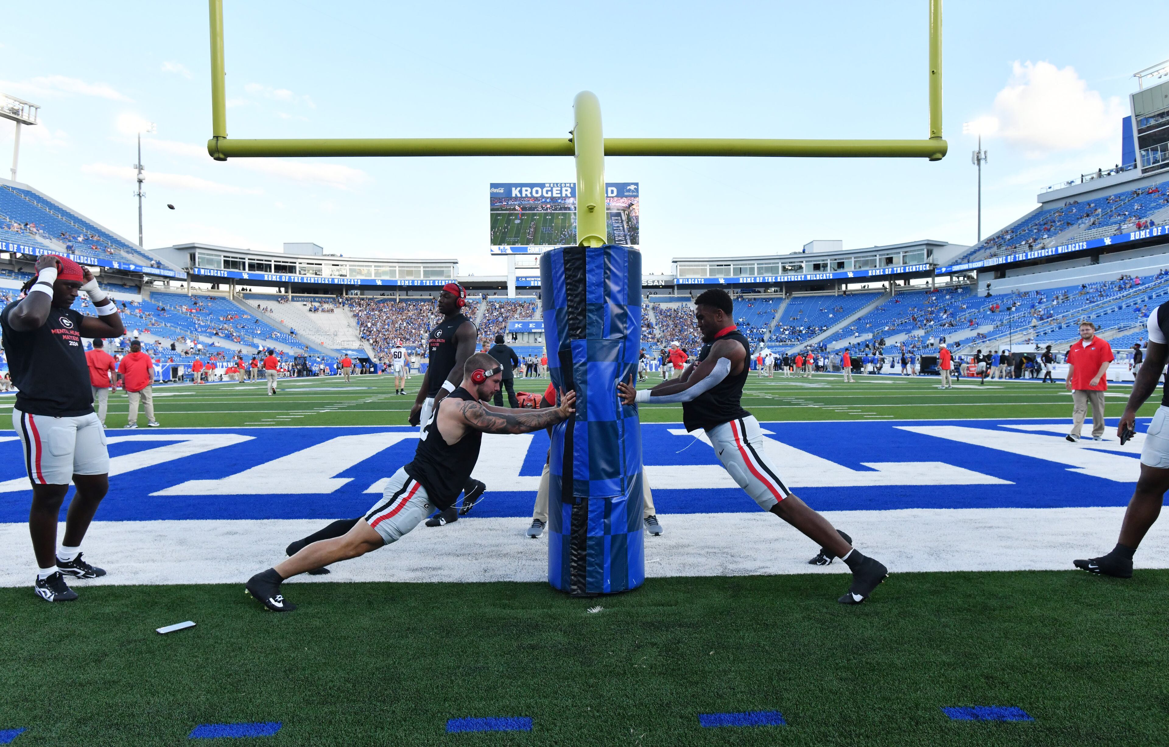 Georgia players warm up before an NCAA football game against Kentucky at Kroger Field, Saturday, September 14, 2024, in Lexington, Kentucky. (Hyosub Shin / AJC)