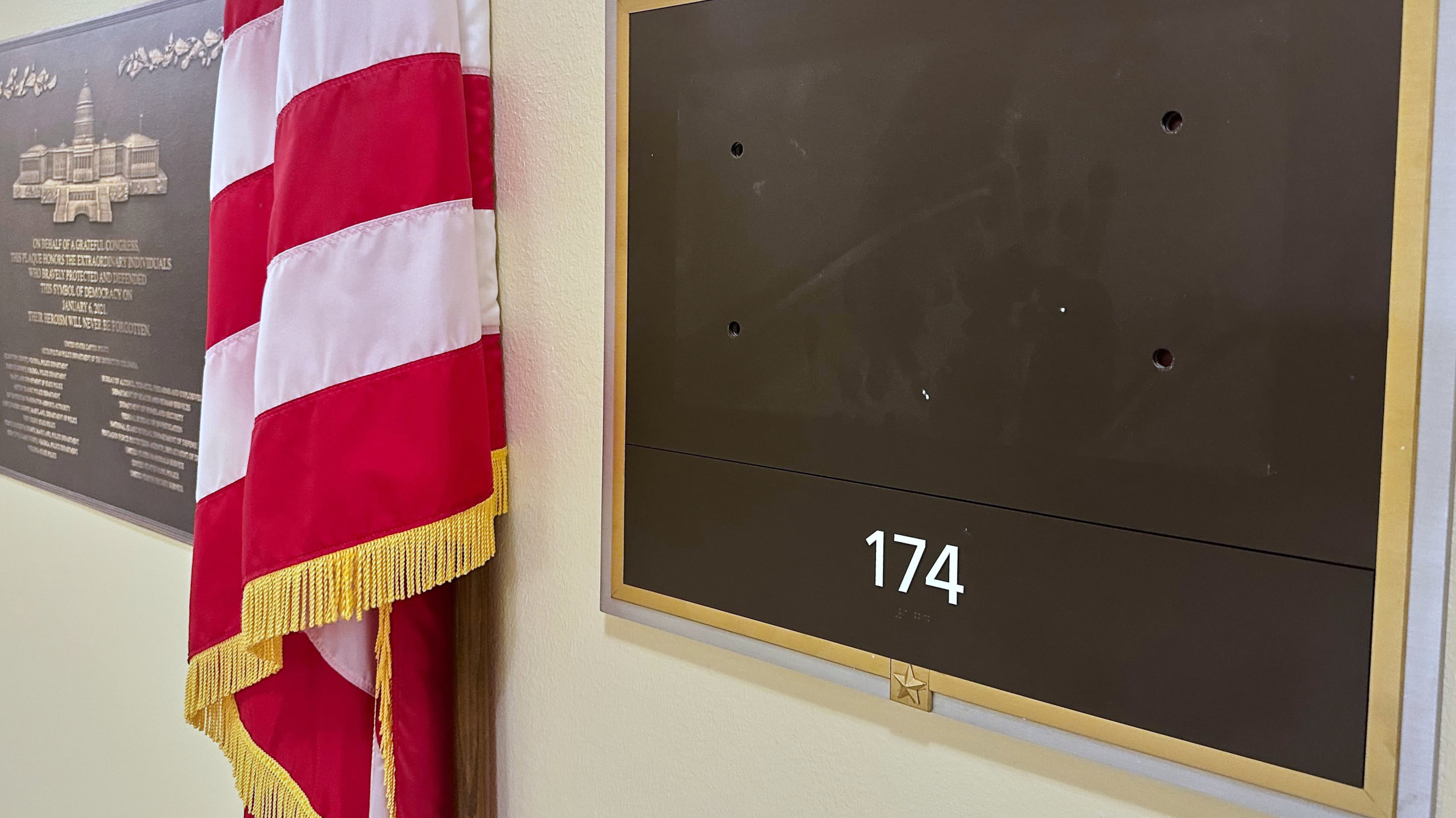 FILE - The name plate of Rep. Eric Swalwell, D-Calif., has been removed from his former office, April 15, 2026, on Capitol Hill in Washington. (AP Photo/Nathan Ellgren, File)