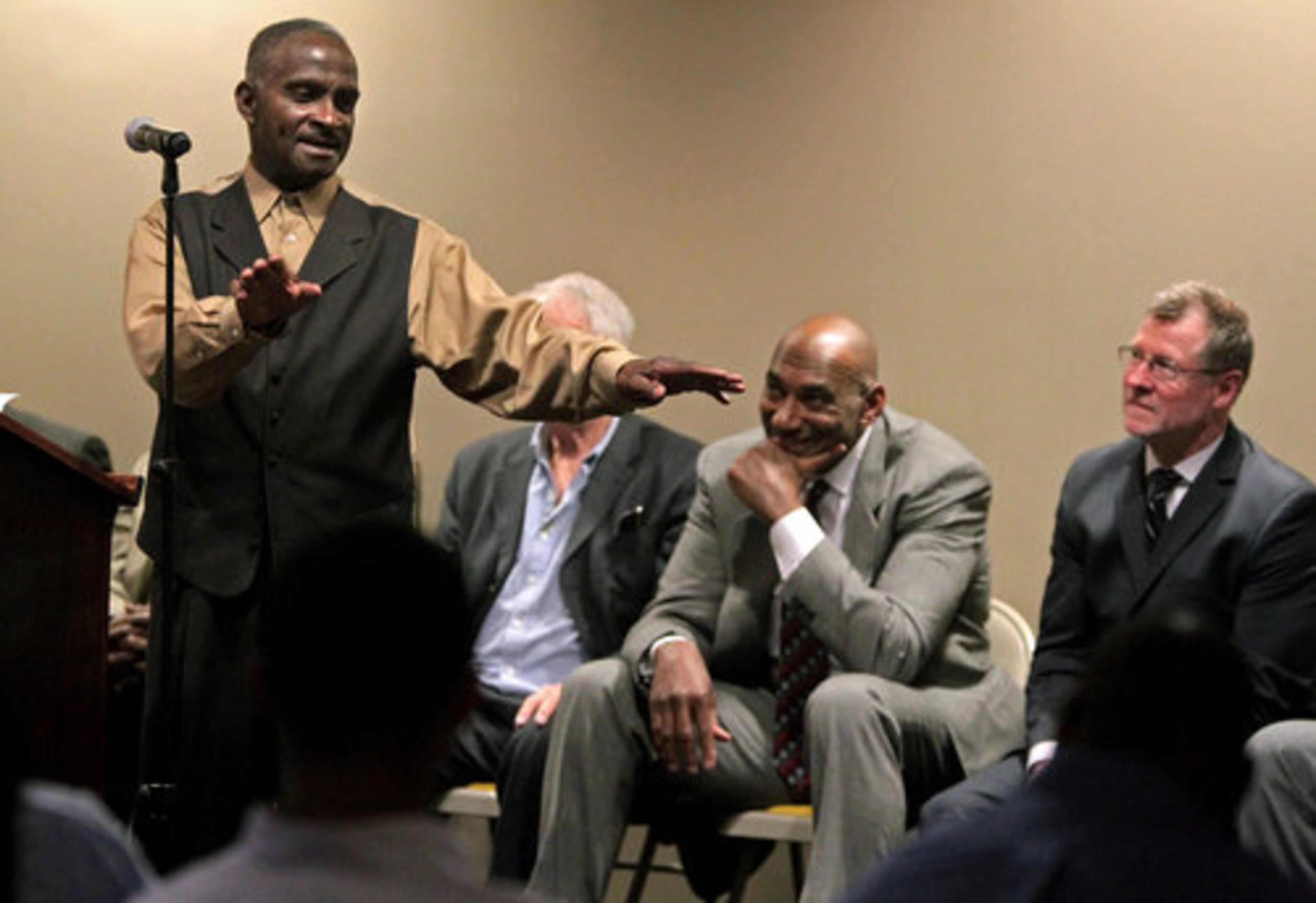 Louis Hill talked about how his son Drew, growing up in Newnan, wanted to play basketball but he played football instead because his father wanted him to. Also pictured are former Georgia Tech players Kent Hill, center, and Jimmy Robinson.