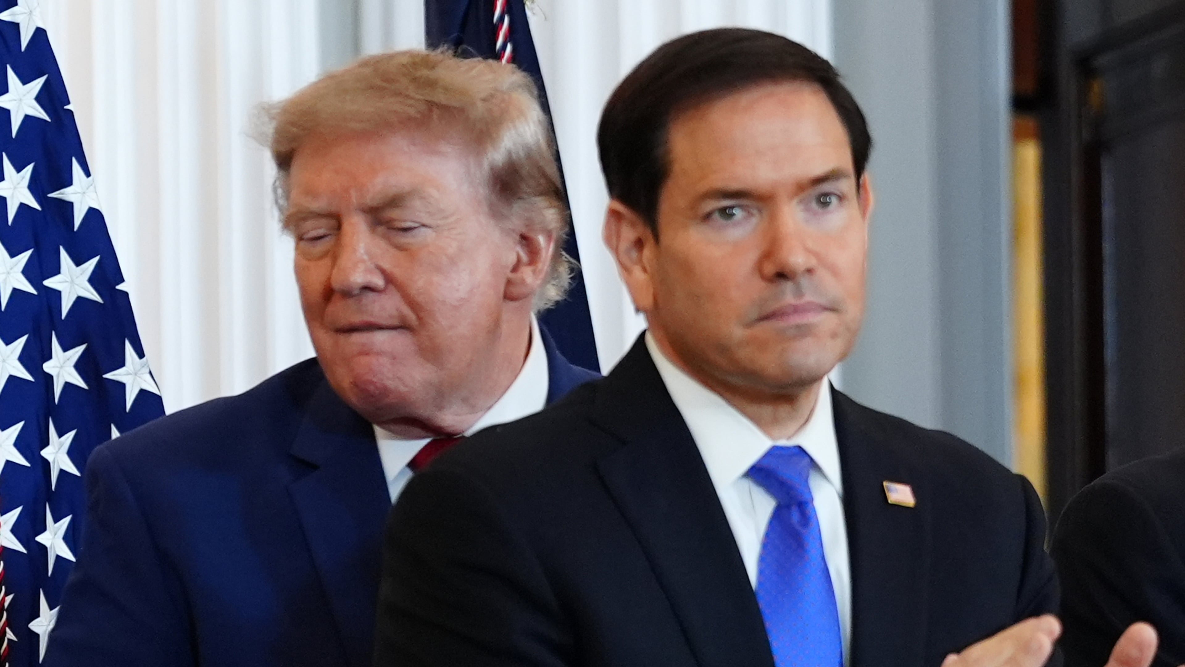 President Donald Trump walks past Secretary of State Marco Rubio as he arrives for a roundtable on the American mining industry, Friday, Aug. 7, 2026, at the State Department in Washington. (AP Photo/Julia Demaree Nikhinson)