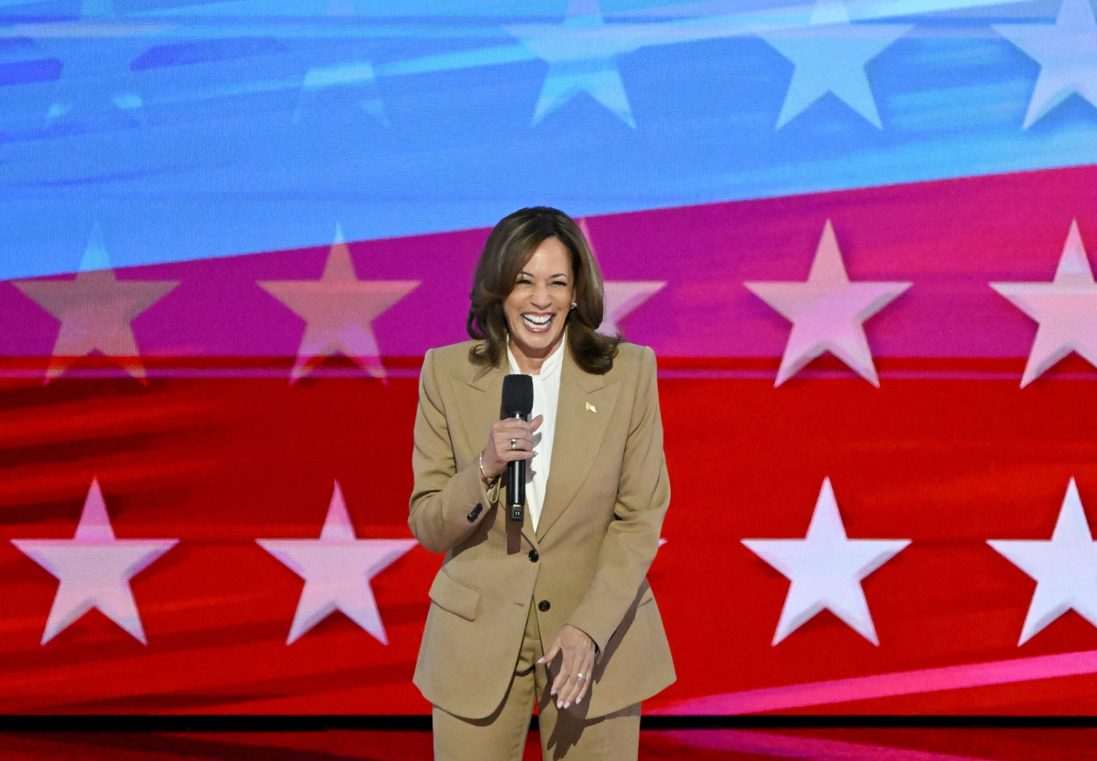 Vice President Kamala Harris appears on the stage during the day 1 of the Democratic National Convention at the United Center, Monday, August 19, 2024, in Chicago, Illinois. (Hyosub Shin / AJC)