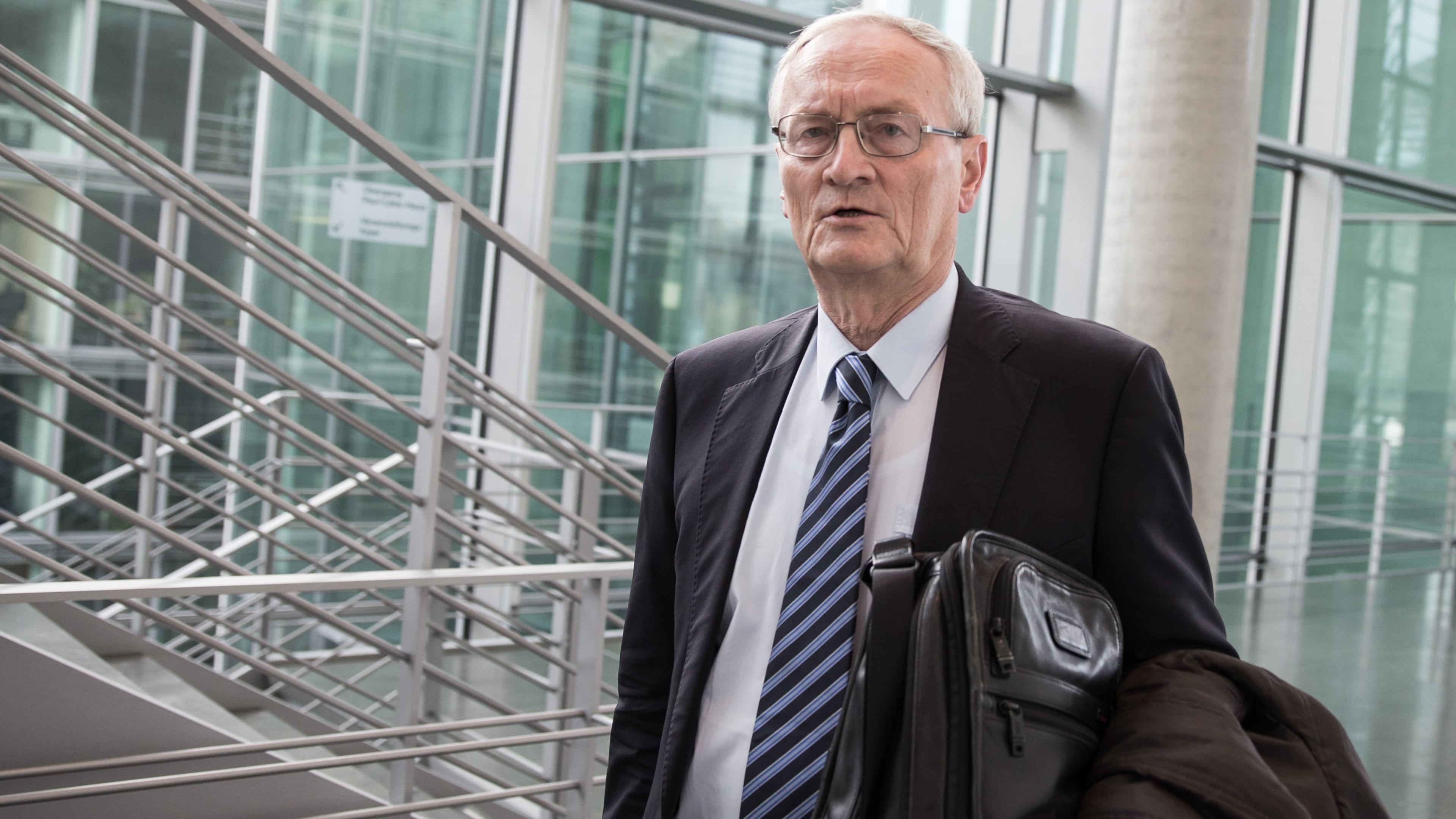 August Hanning, the former president of the Federal Intelligence Service (BND), arrives at the German parliament Bundestag in Berlin on Oct. 2, 2015. (Michael Kappeler/dpa via AP)