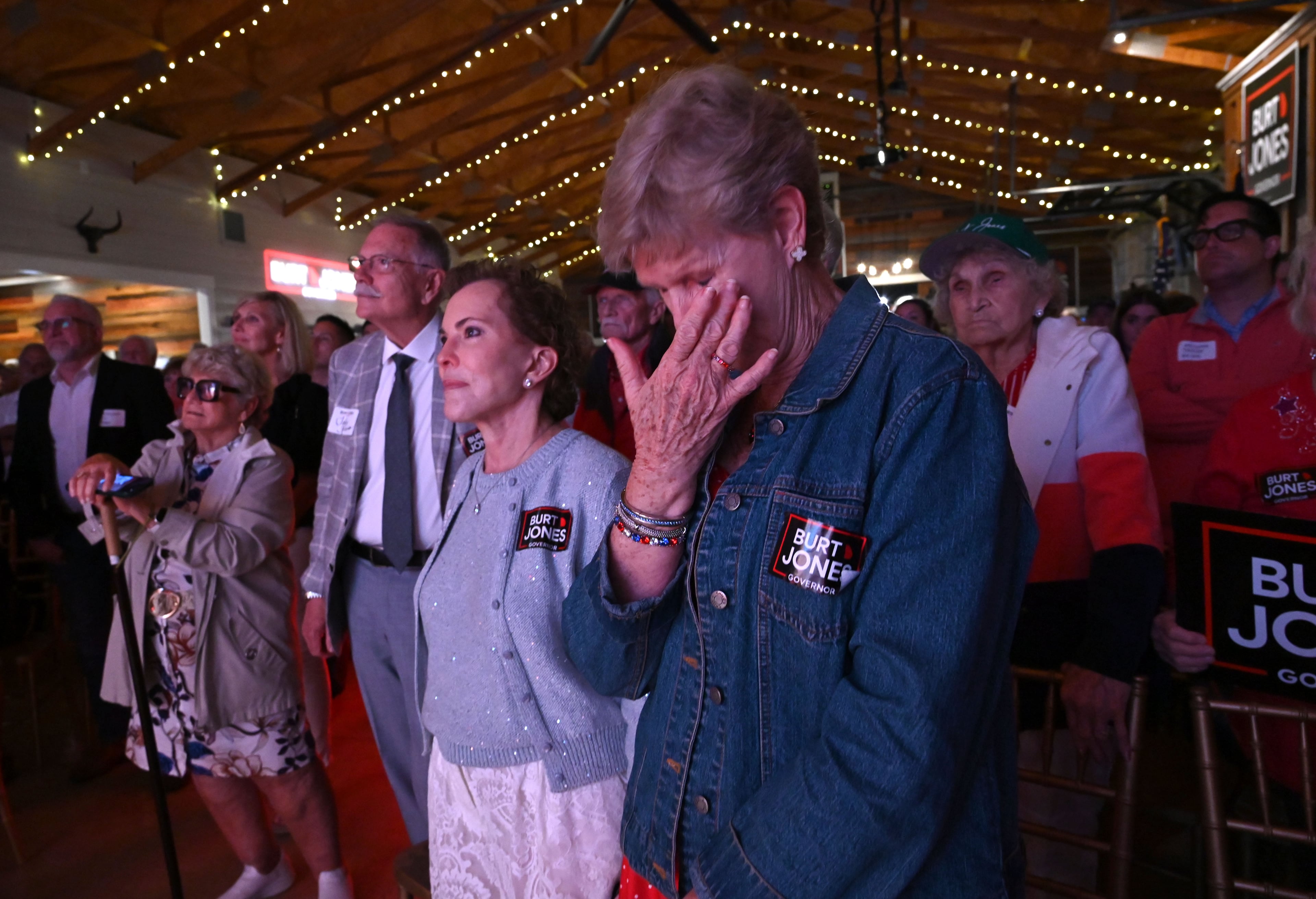 Supporters react as Georgia gubernatorial candidate Burt Jones addresses supporters at his election night watch party at The Rivers Ranch during Georgia’s primary runoff on Tuesday, June 16, 2026, in Jackson. (Hyosub Shin/AJC)