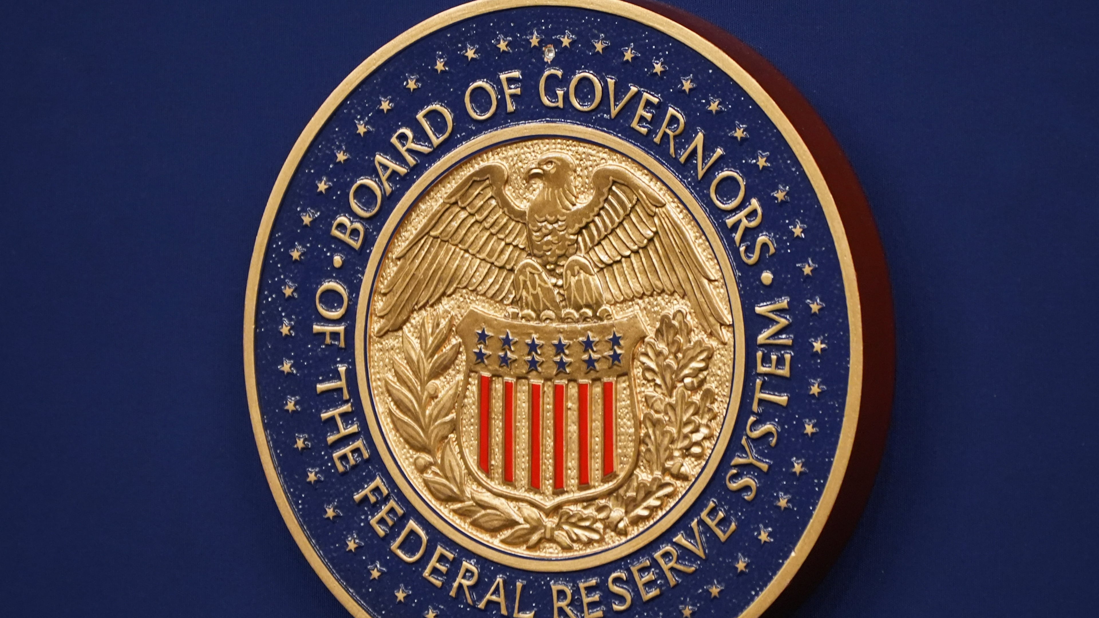 The Federal Reserve Chair logo appears on a podium at the Federal Reserve, Wednesday, Dec. 10, 2025, in Washington. (AP Photo/Jacquelyn Martin)