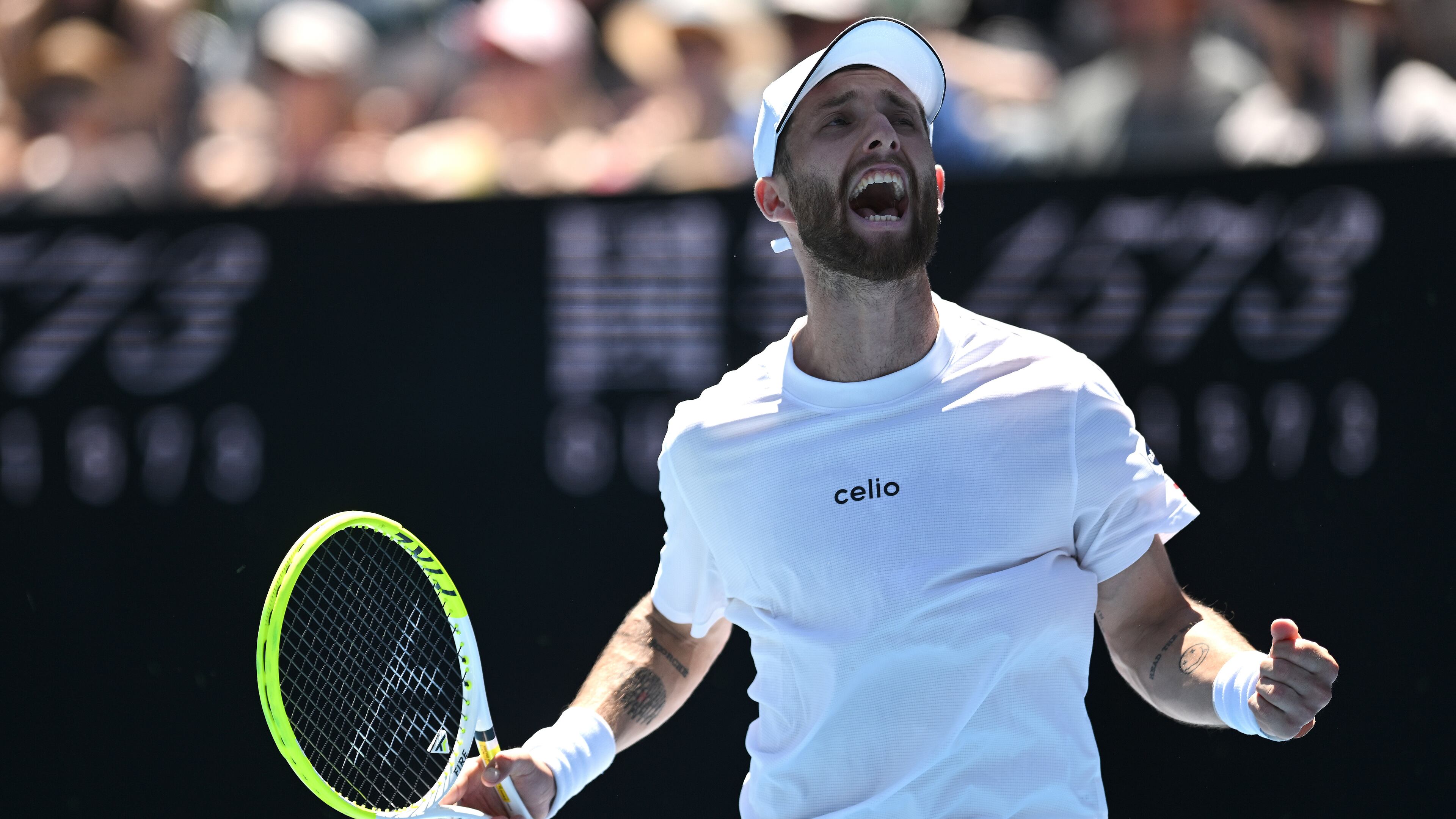 Corentin Moutet of France reacts during his first round match against Tristan Schoolkate of Australia at the Australian Open tennis championship in Melbourne, Australia, Sunday, Jan. 18, 2026. (Lukas Coch/AAP Image via AP)