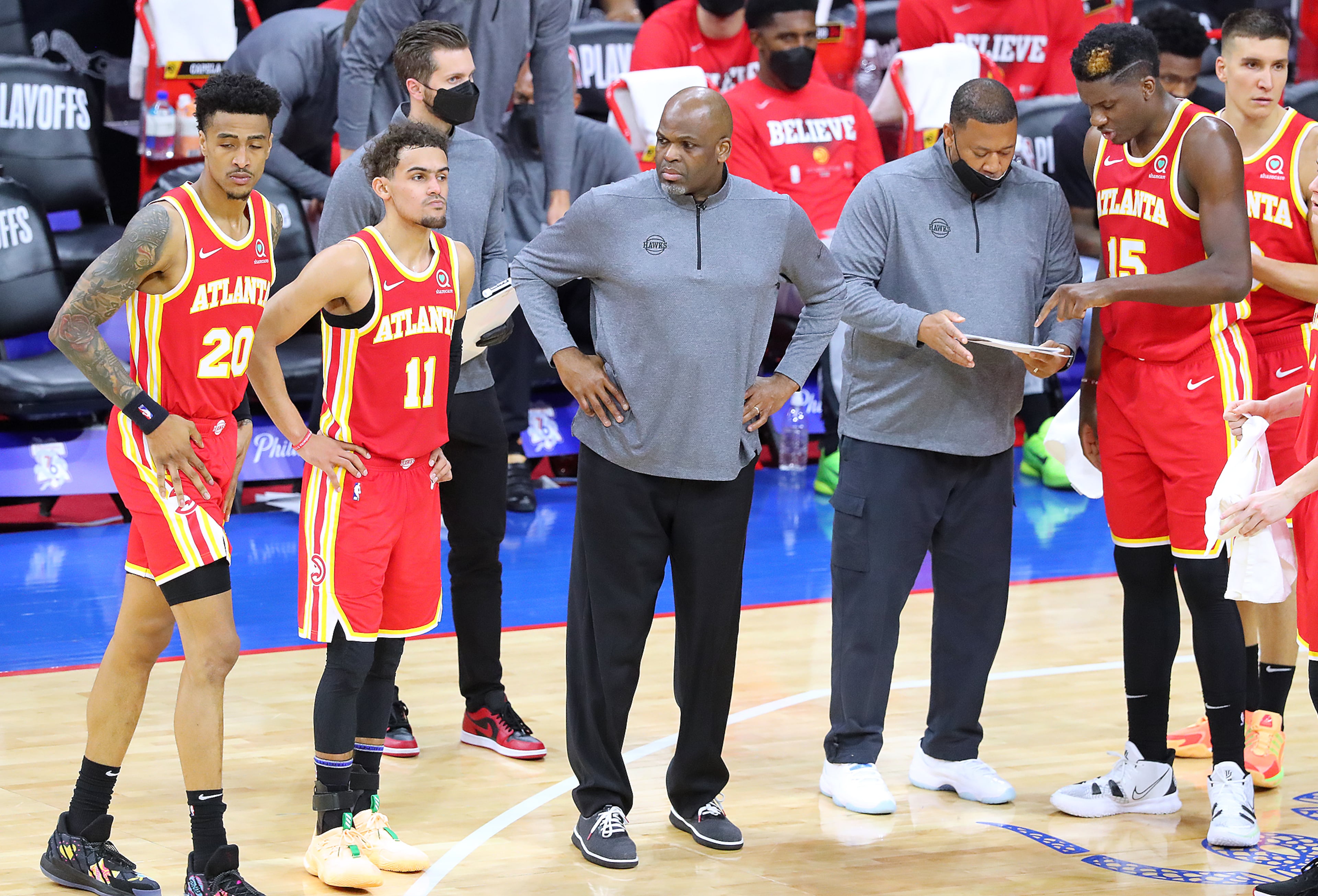 Hawks interim head coach Nate McMillan (center) calls a timeout against the Philadelphia 76ers during the final minutes in game 2 of their NBA Eastern Conference semifinals series on Tuesday, June 8, 2021, in Philadelphia. “Curtis Compton / Curtis.Compton@ajc.com”