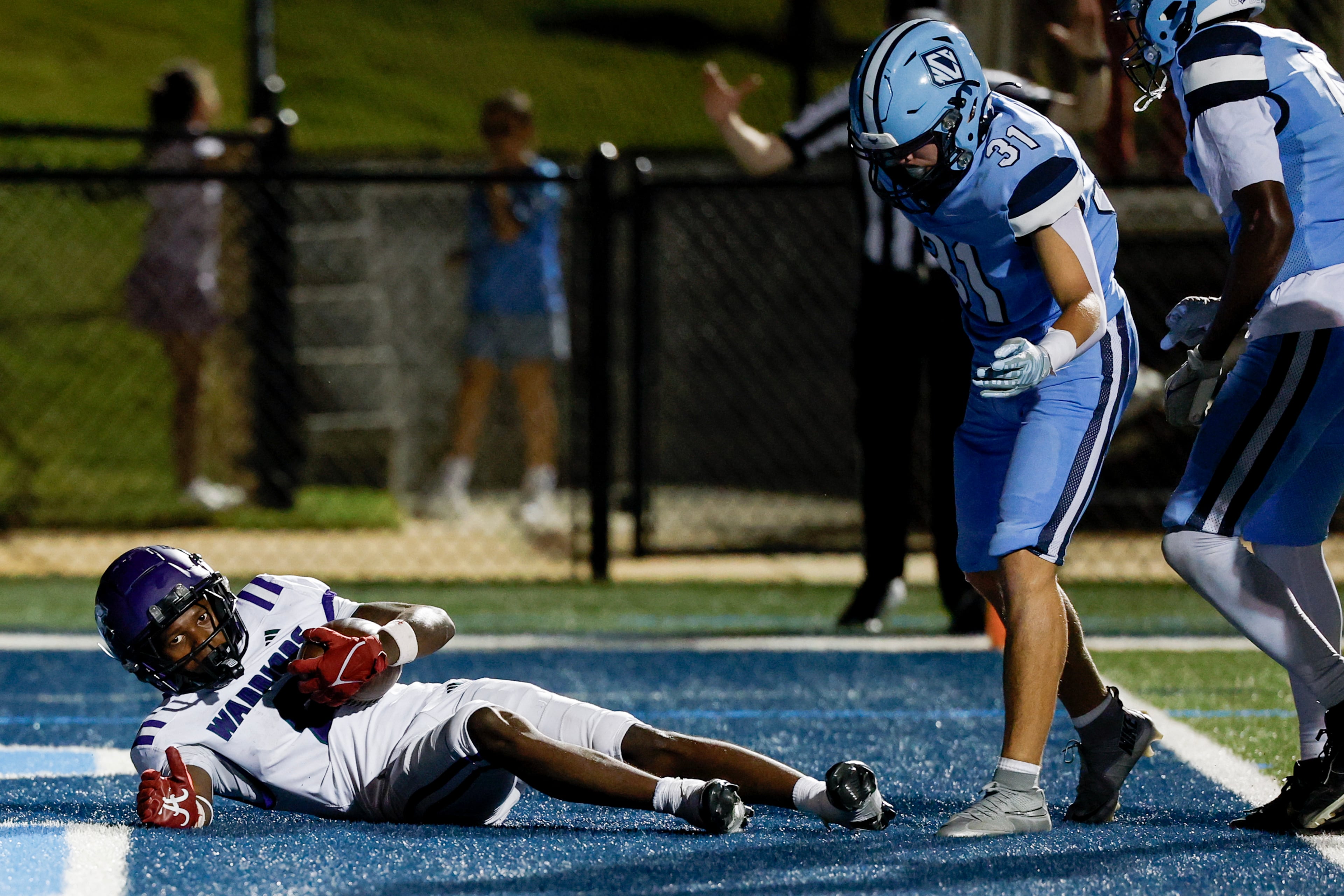 KIPP Atlanta’s Vincent Lawrence (left) scores against North Cobb Christian’s Alex Queen on Friday, Oct. 2, 2026, in Kennesaw. (Erik S. Lesser for the AJC)