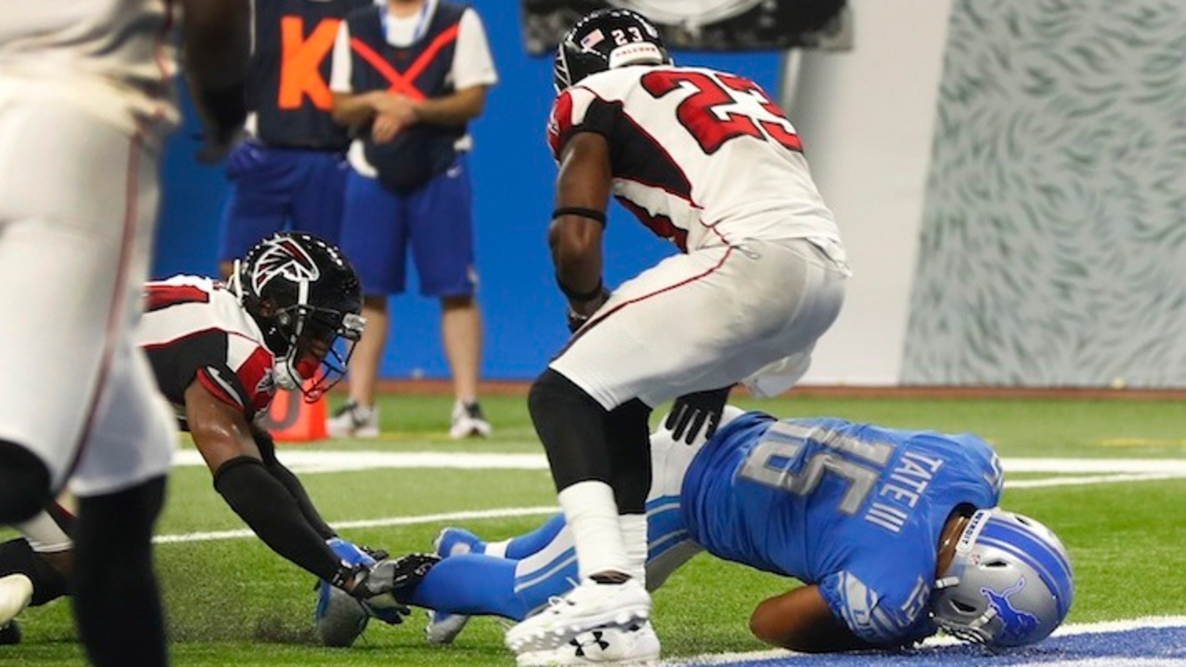 Detroit Lions wide receiver Golden Tate (15) falls into the end zone for a 1-yard touchdown reception during the second half of an NFL football game, Sunday, Sept. 24, 2017, in Detroit. The Replay Official reviewed the score ruling, and the play was reversed. After play reversal, referee rules a 10 second runoff and the game is over. The Falcons won 30-26. (AP Photo/Paul Sancya)