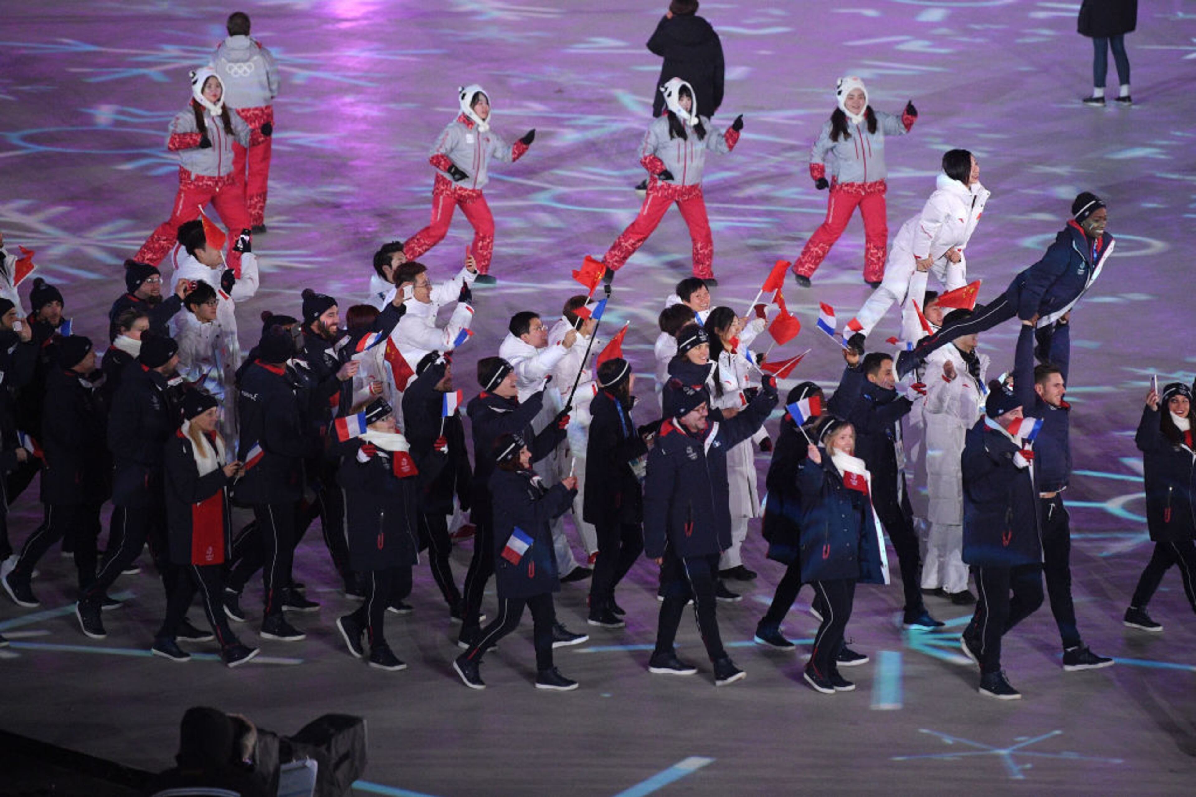 PYEONGCHANG-GUN, SOUTH KOREA - FEBRUARY 25: Team France and Team China walk in the Parade of Athletes during the Closing Ceremony of the PyeongChang 2018 Winter Olympic Games at PyeongChang Olympic Stadium on February 25, 2018 in Pyeongchang-gun, South Korea. (Photo by David Ramos/Getty Images)