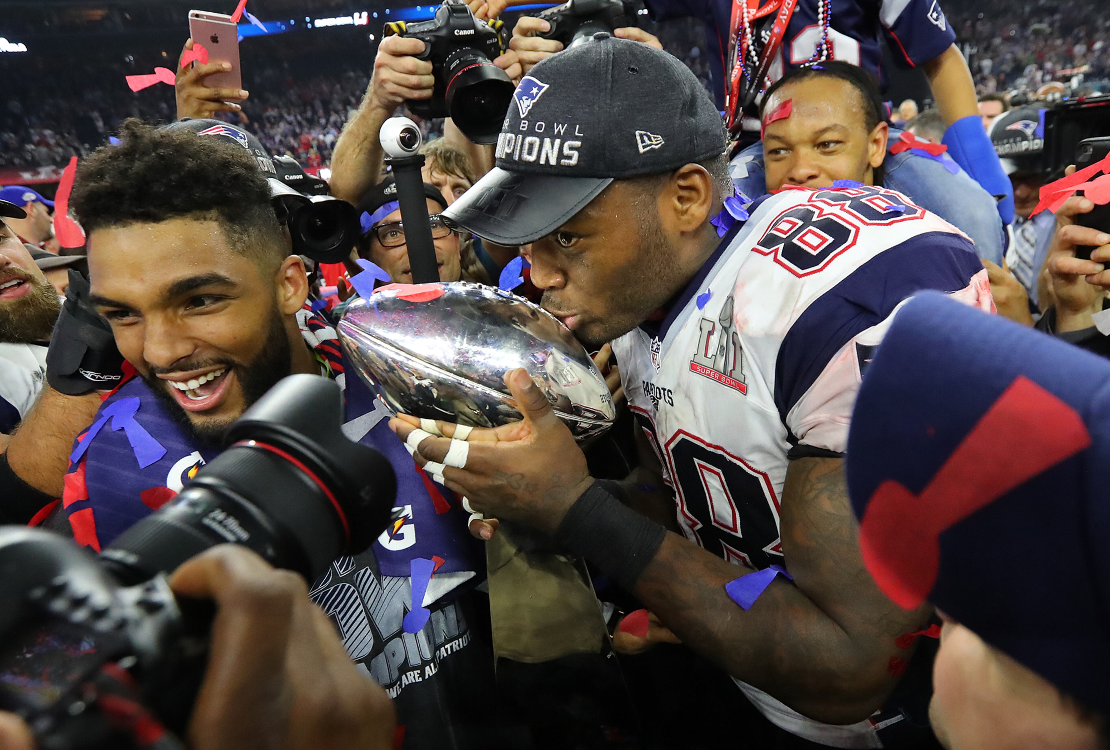 February 5, 2017, Houston: Patriots Martellus Bennett kisses the Lombardi Trophy after beating the Falcons 34-28 to win the Super Bowl on Sunday Feb. 5, 2017, in Houston. Curtis Compton/ccompton@ajc.com