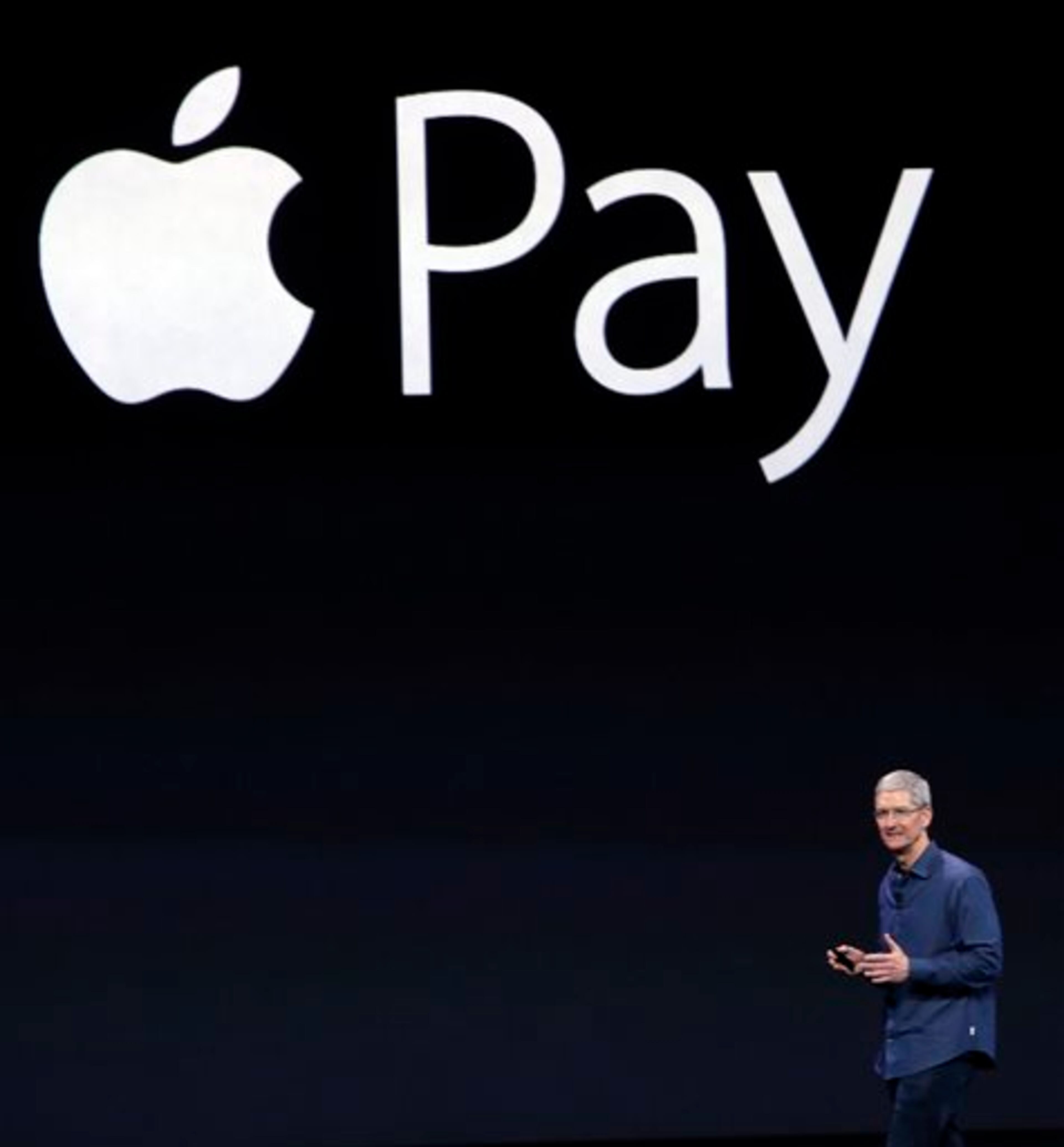 Apple CEO Tim Cook introduces the new Apple Pay product on Tuesday, Sept. 9, 2014, in Cupertino, Calif. (AP Photo/Marcio Jose Sanchez)
