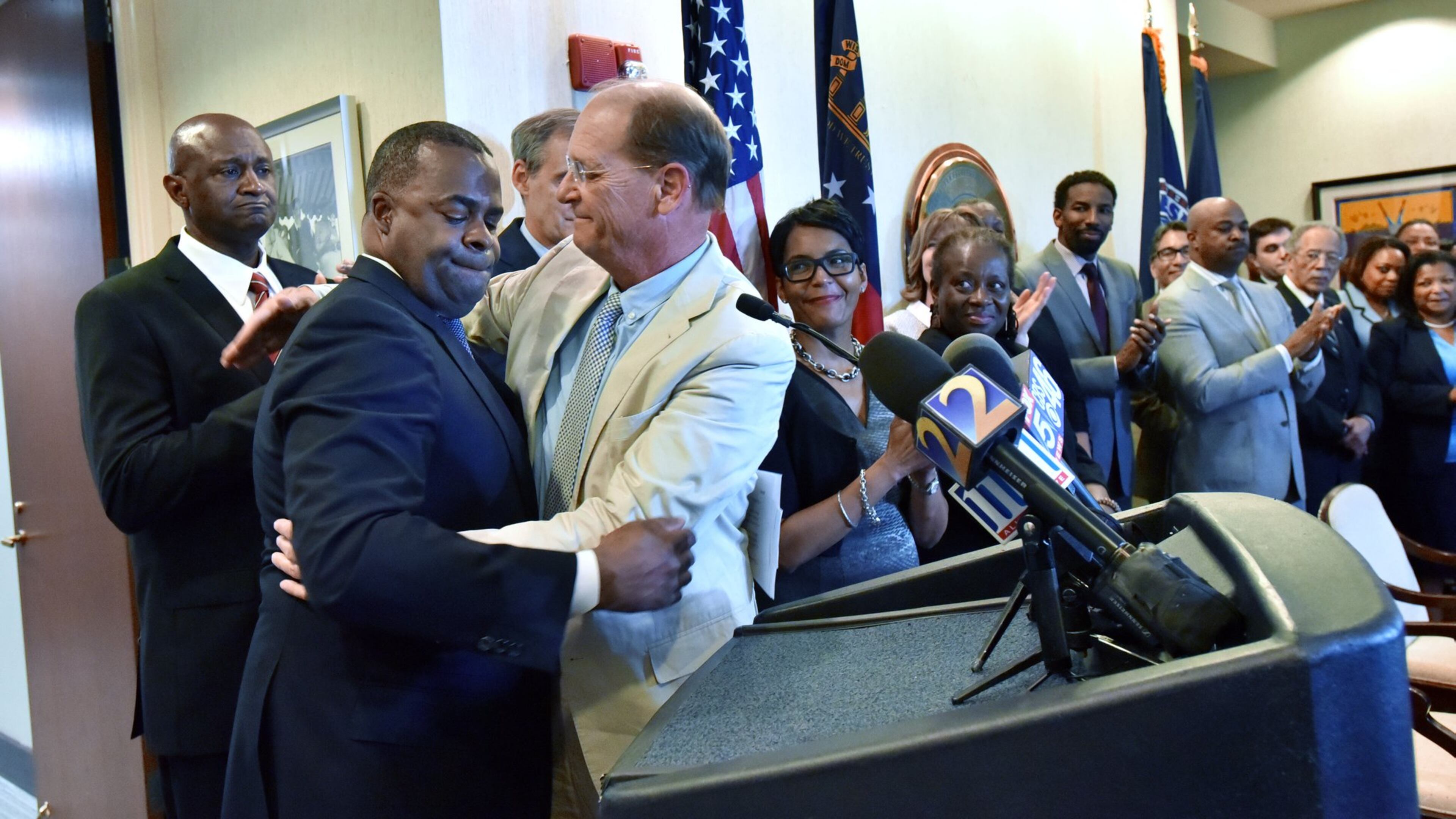 Atlanta Mayor Kasim Reed and Richard Anderson, CEO of Delta Air Lines, get emotional in April before they sign a new lease deal that will keep Delta’s headquarters at Atlanta’s airport for the next two decades. HYOSUB SHIN / HSHIN@AJC.COM