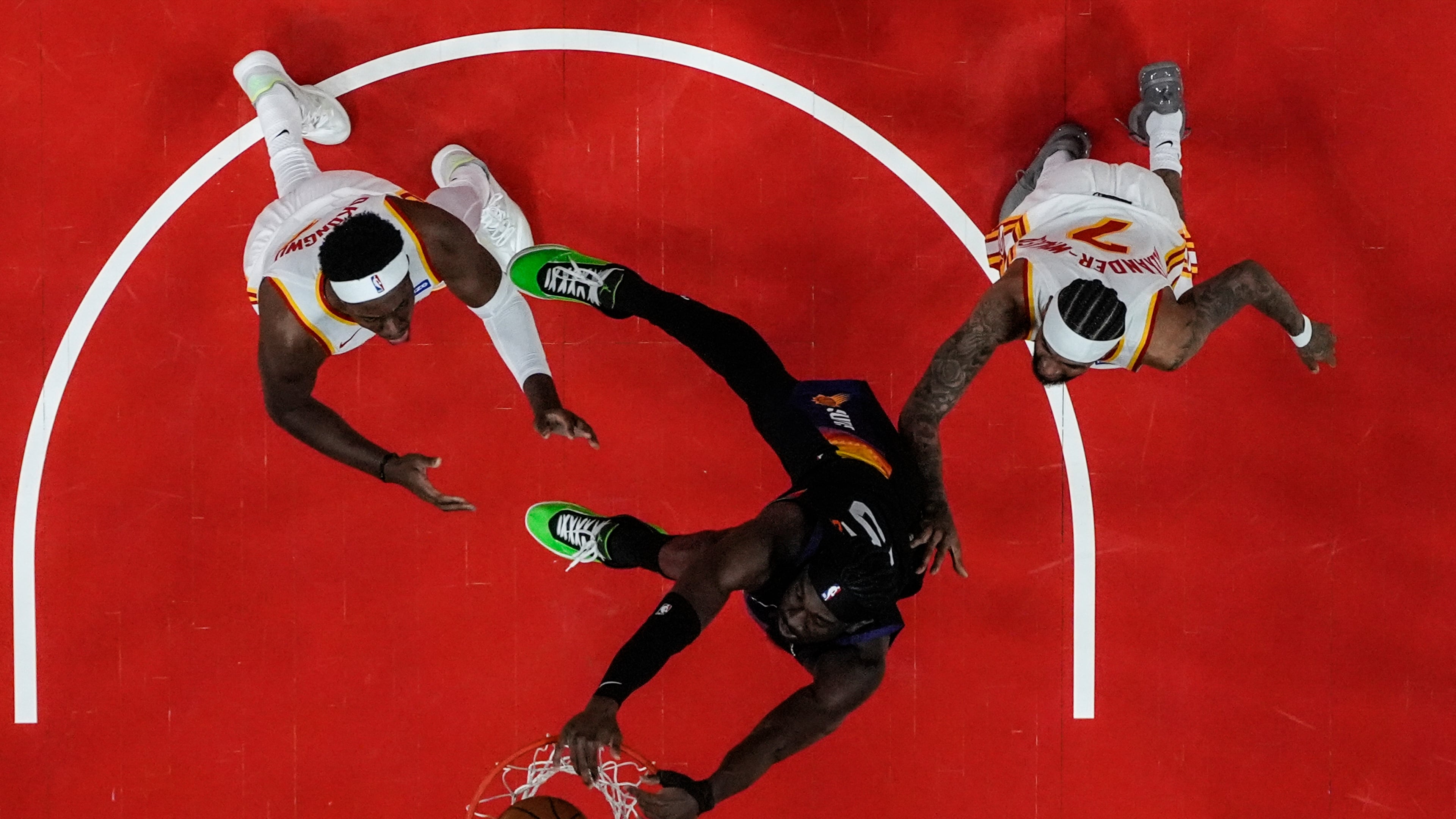 Phoenix Suns center Mark Williams (15) shoots against the Atlanta Hawks during the first half of an NBA basketball game, Friday, Jan. 23, 2026, in Atlanta. (Mike Stewart/AP)