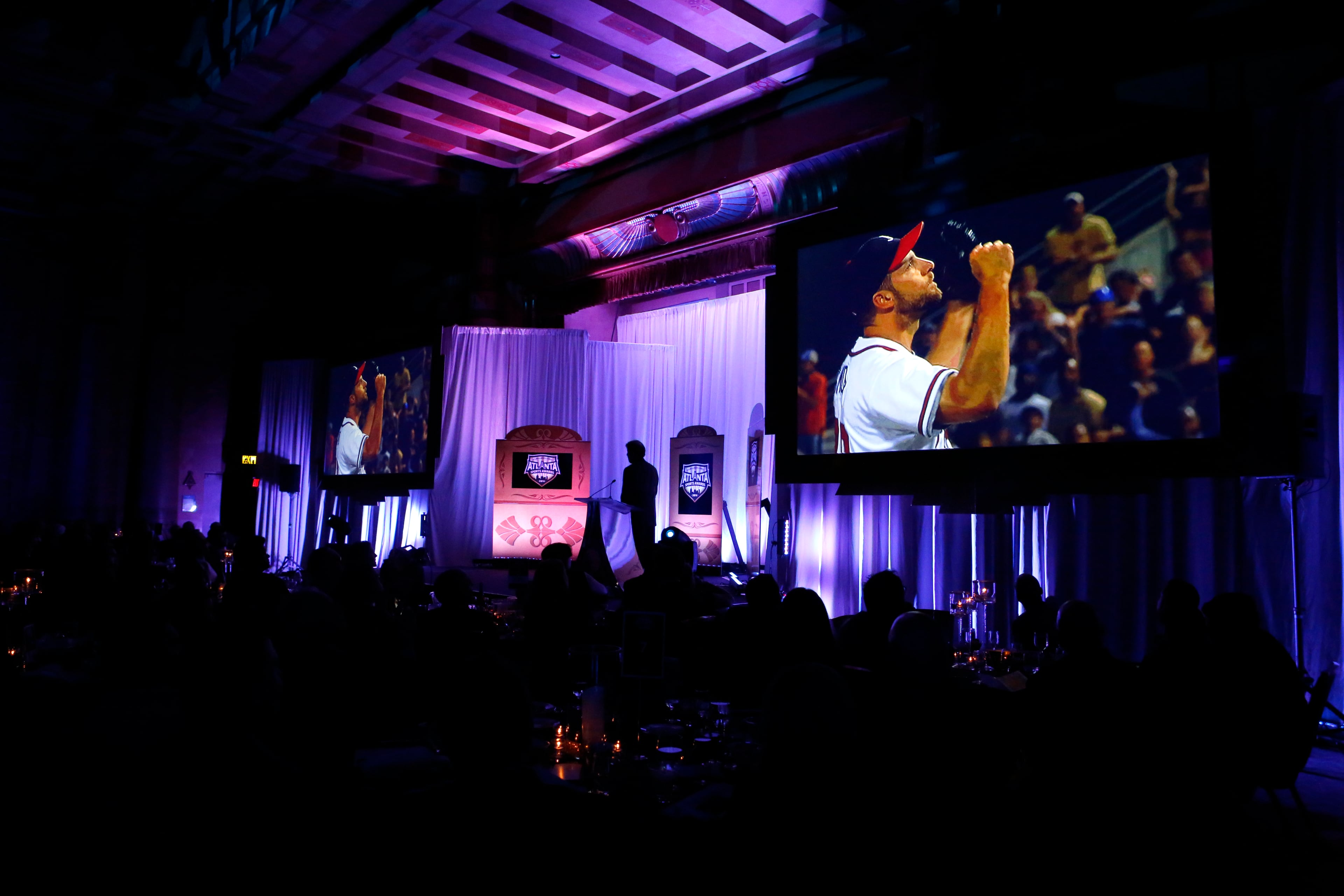 A video of former Atlanta Braves pitcher John Smoltz is shown before Smoltz received the 2016 Lifetime Achievement Award during the Atlanta Sports Awards at the Fox Theatre Thursday, February 25, 2016, in Atlanta. PHOTO / JASON GETZ