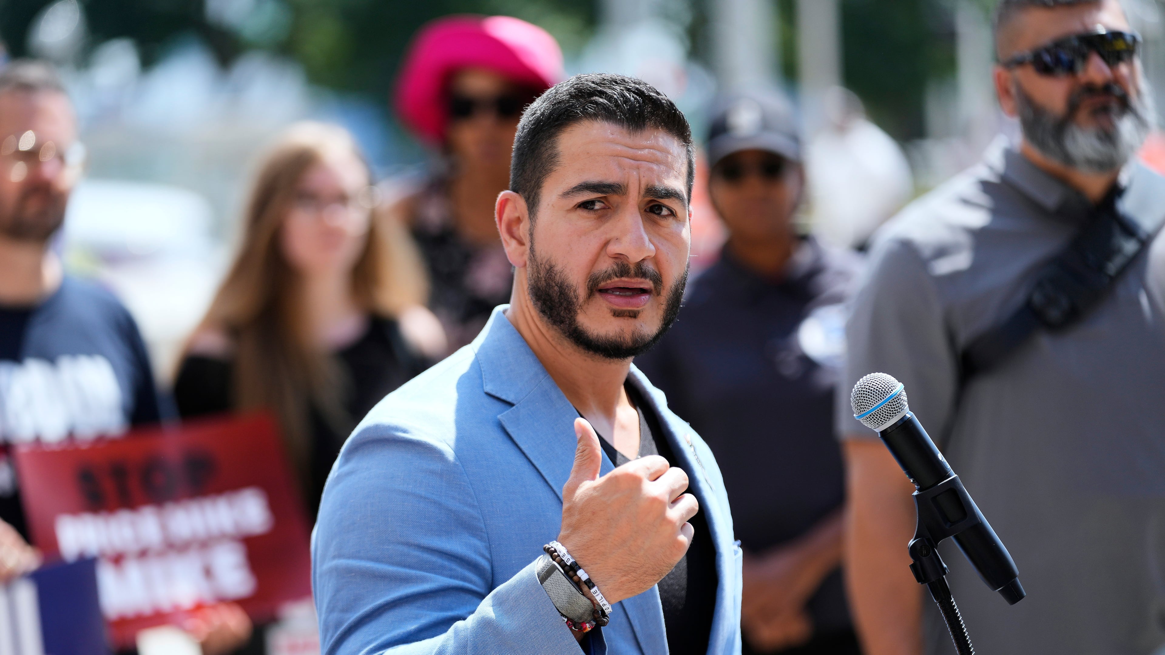 Democratic nominee for U.S. Senate Abdul El-Sayed speaks at a news conference at the base of the Spirit of Detroit monument in Detroit, Wednesday, Aug. 19, 2026. (AP Photo/Paul Sancya)