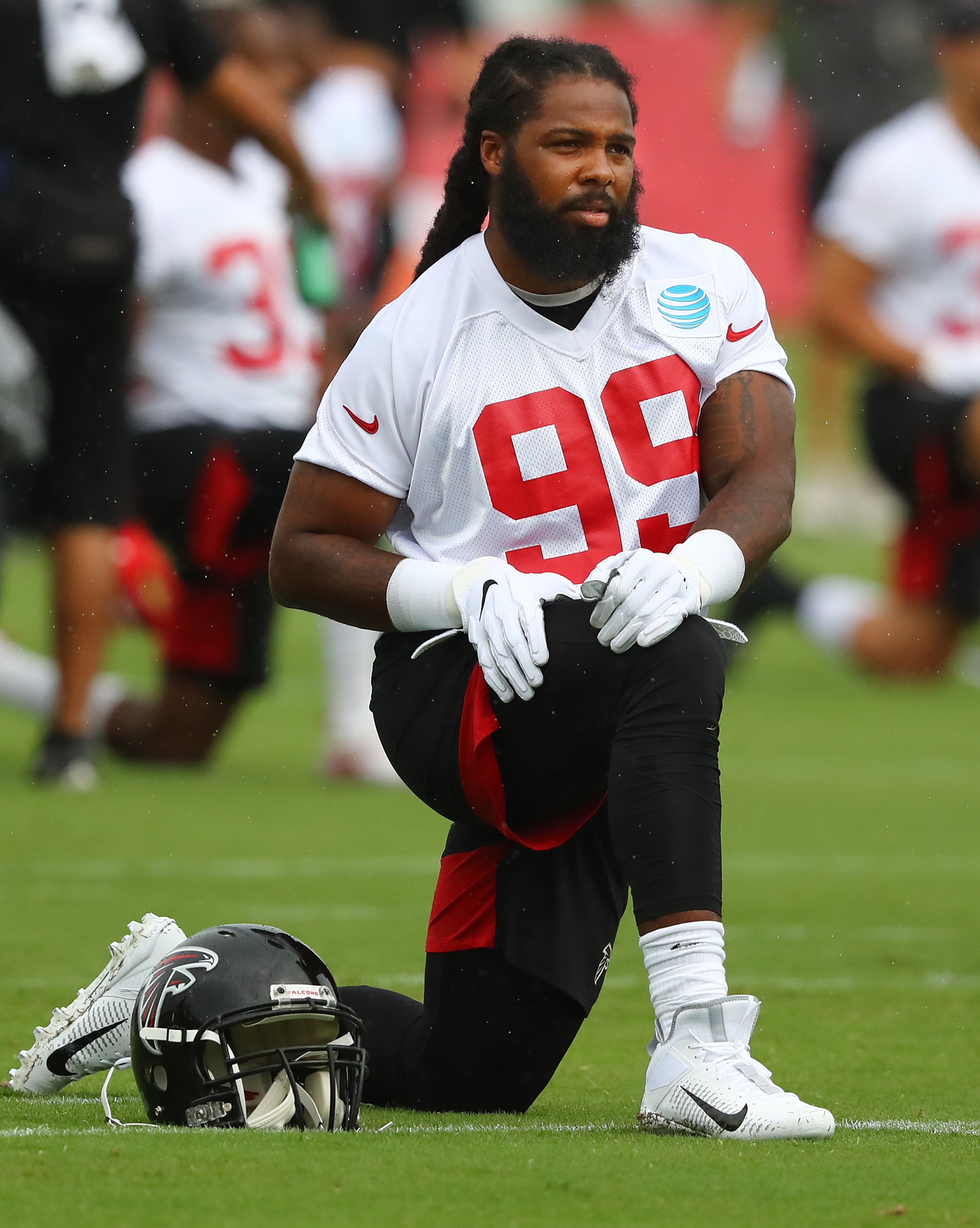 Falcons defensive end Adrian Clayborn loosens up. Curtis Compton/ccompton@ajc.com