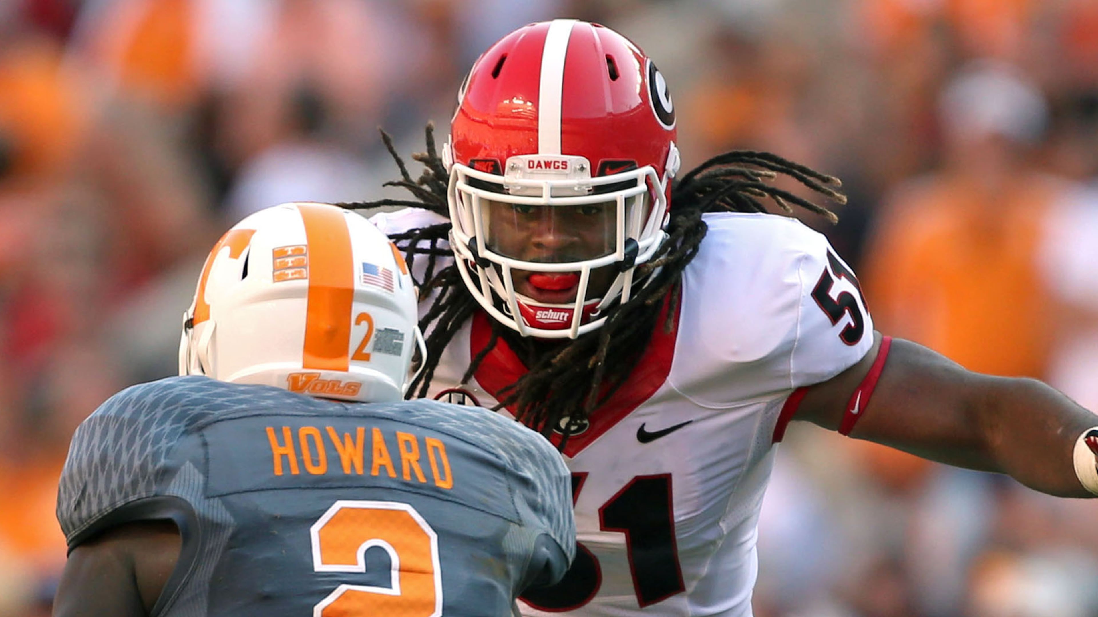 October 5, 2013 - Knoxville, Tn: Georgia Bulldogs linebacker Ramik Wilson (51) gets in position for a tackle on Tennessee Volunteers wide receiver Alton Howard (2) during Georgia's win over Tennessee at Neyland Stadium Saturday afternoon in Knoxville, Tn., October 5, 2013. JASON GETZ / JGETZ@AJC.COM