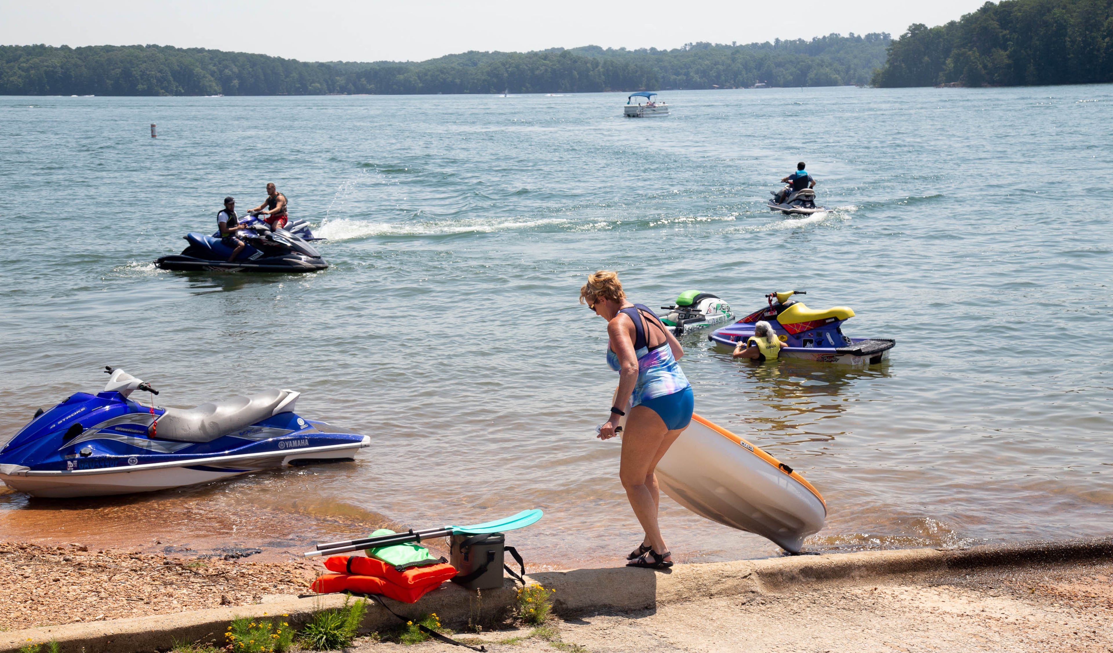 People get their watercrafts ready at the boat launch at Mary Alice Beach Park in Lake Lanier on Sunday, July 5, 2020. STEVE SCHAEFER FOR THE ATLANTA JOURNAL-CONSTITUTION