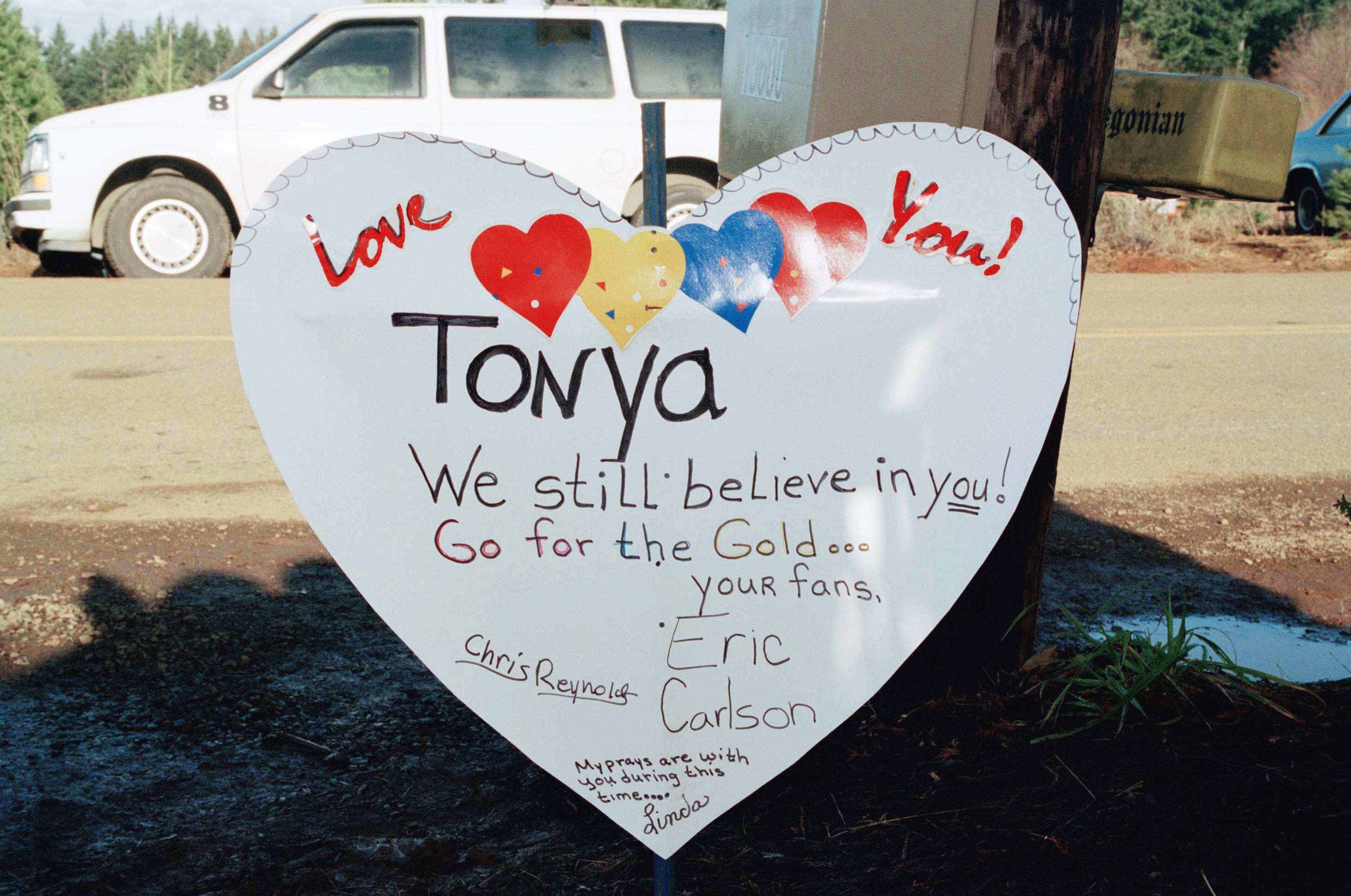 A sign showing support for figure skater Tonya Harding sits outside her home on Jan. 16, 1994 in Beavercreek, Oregon. Harding released a statement through her attorney categorically denying all accusations that she was involved in the assault on skater Nancy Kerrigan. (AP Photo/Steve Slocum)