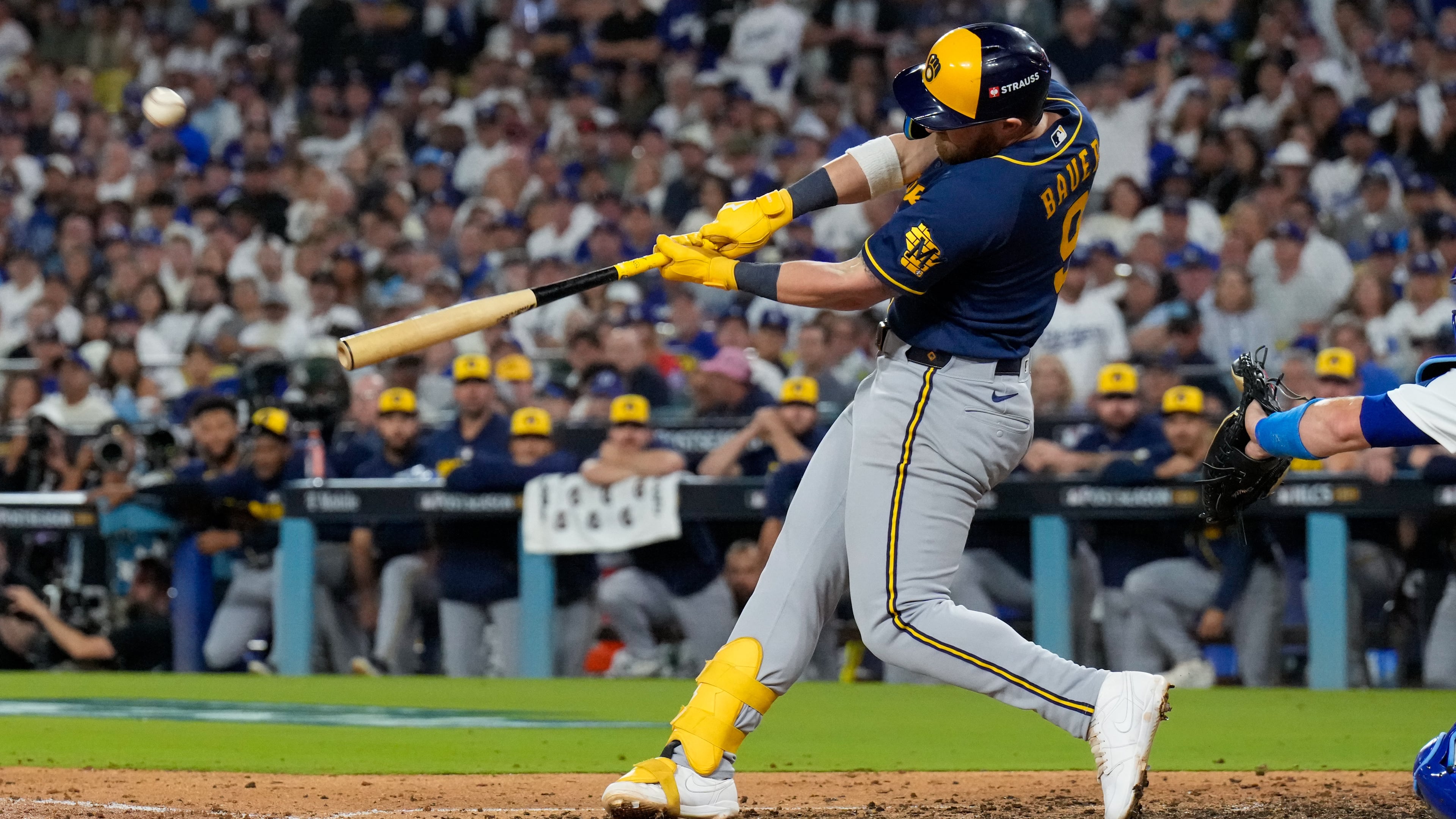 Milwaukee Brewers first baseman Jake Bauers connects for a two run home run during the seventh inning of Game 3 of baseball's National League Championship Series between the Milwaukee Brewers and the Los Angeles Dodgers, Wednesday, Oct. 14, 2026, in Los Angeles. (AP Photo/Ashley Landis)