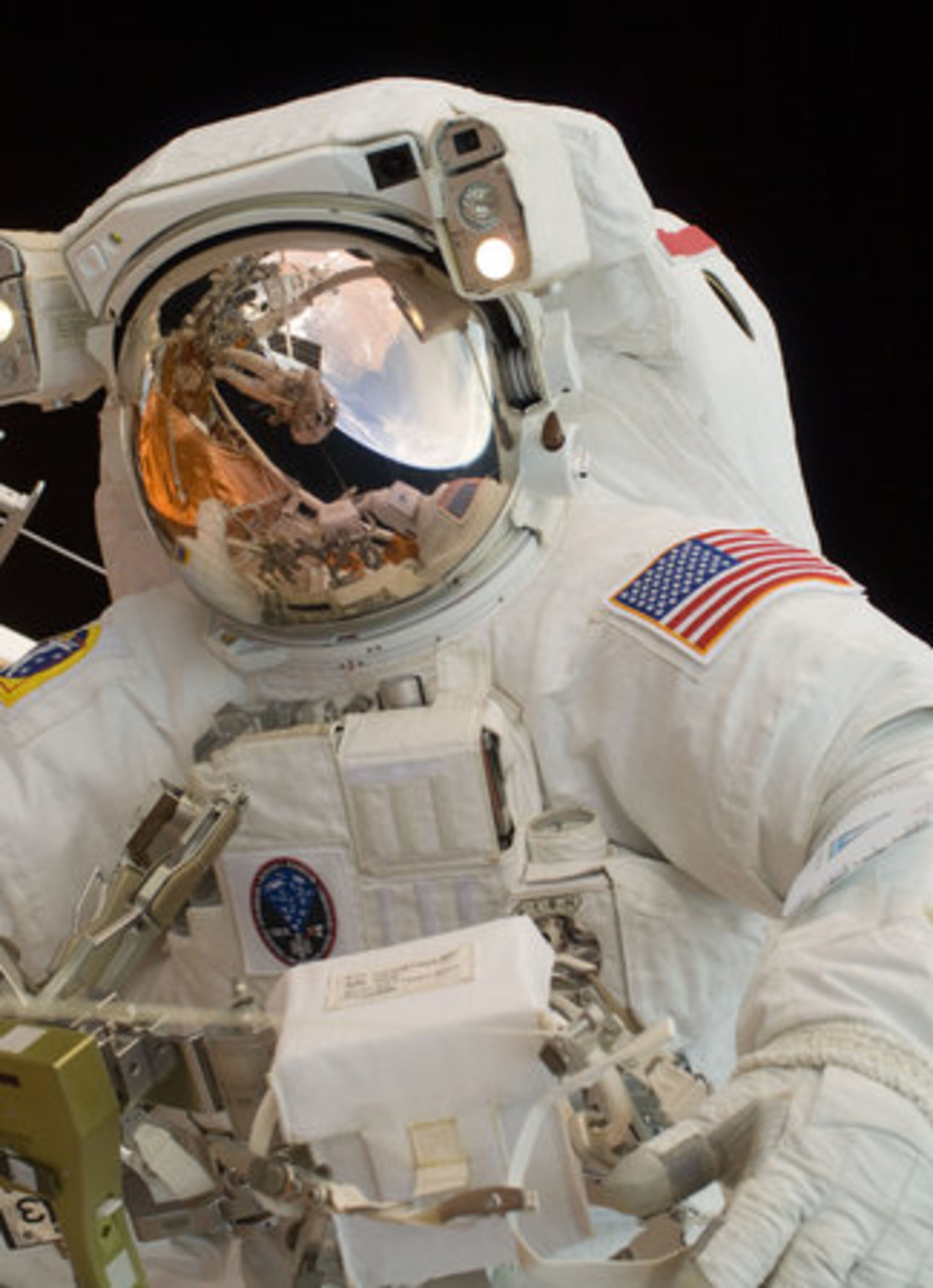John Grunsfeld during Thursday's spacewalk. Replacing Hubble's gyroscopes is the top priority for this final repair mission to the 19-year-old observatory. The gyroscopes are part of the telescope pointing system, and half of the old ones are broken.
