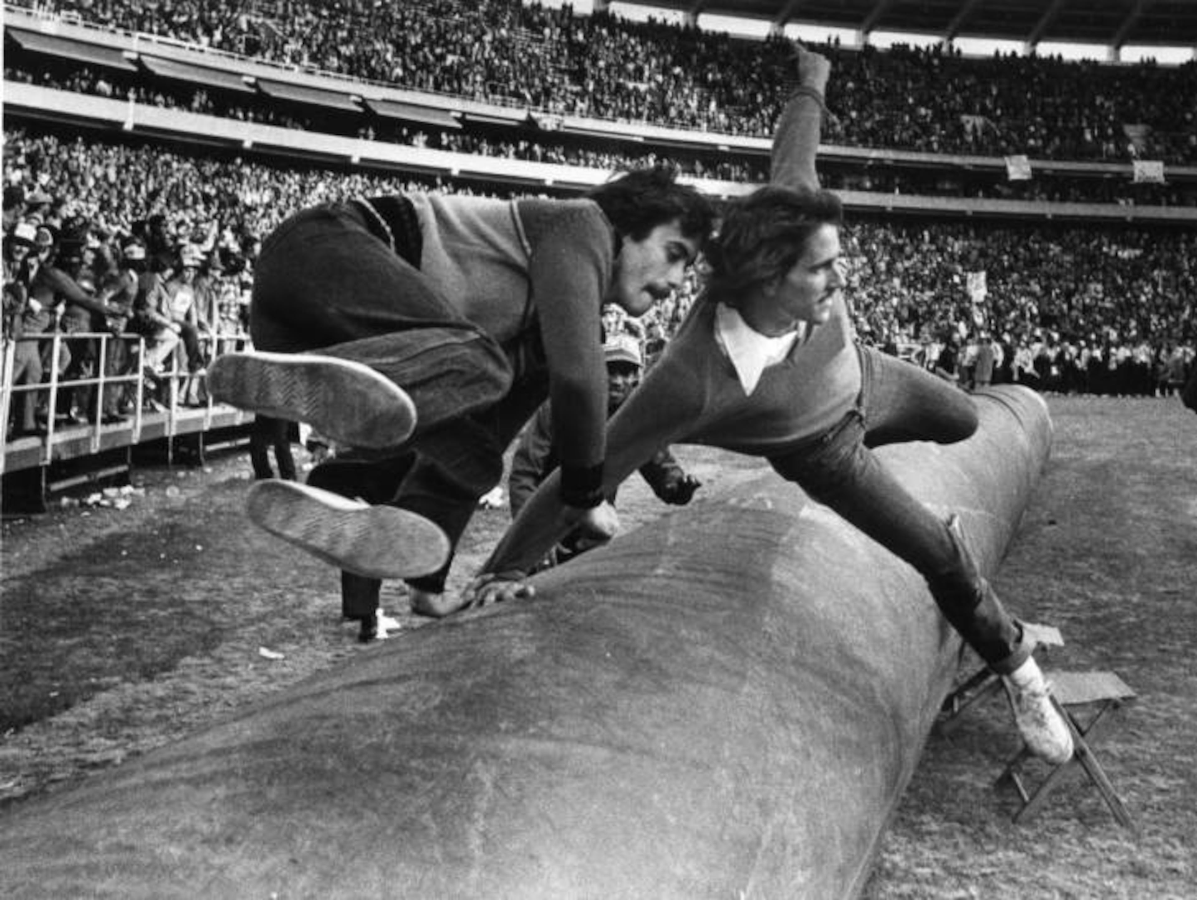 Dec. 14, 1980 -- Fans attempt to rush the field after the Falcons defeat the San Francisco 49ers in Atlanta. BILLY DOWNS / AJC PHOTO ARCHIVES