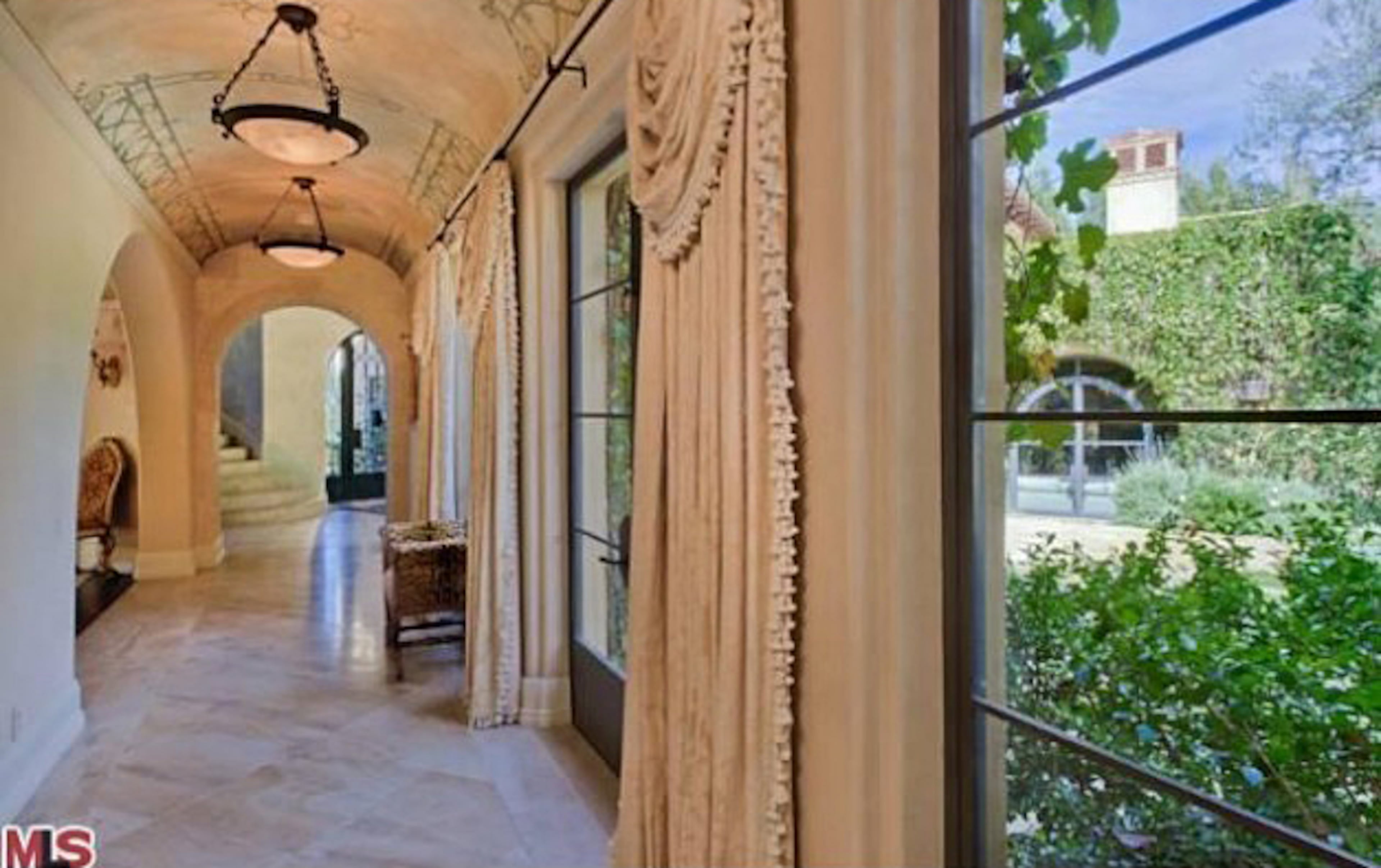 Take a peek inside Christina Aguilera's Beverly Hills mansion. The home, which Aguilera bought for $10.75 million in 2013, features six bedrooms, nine bathrooms, a master suite with a fireplace, a patio, an office, a spa bath, a screening room and wet bars. The property also includes a pool and spa. For more information, visit http://www.toptenrealestatedeals.com/homes/weekly-ten-best-home-deals/2013/5-14-2013/.