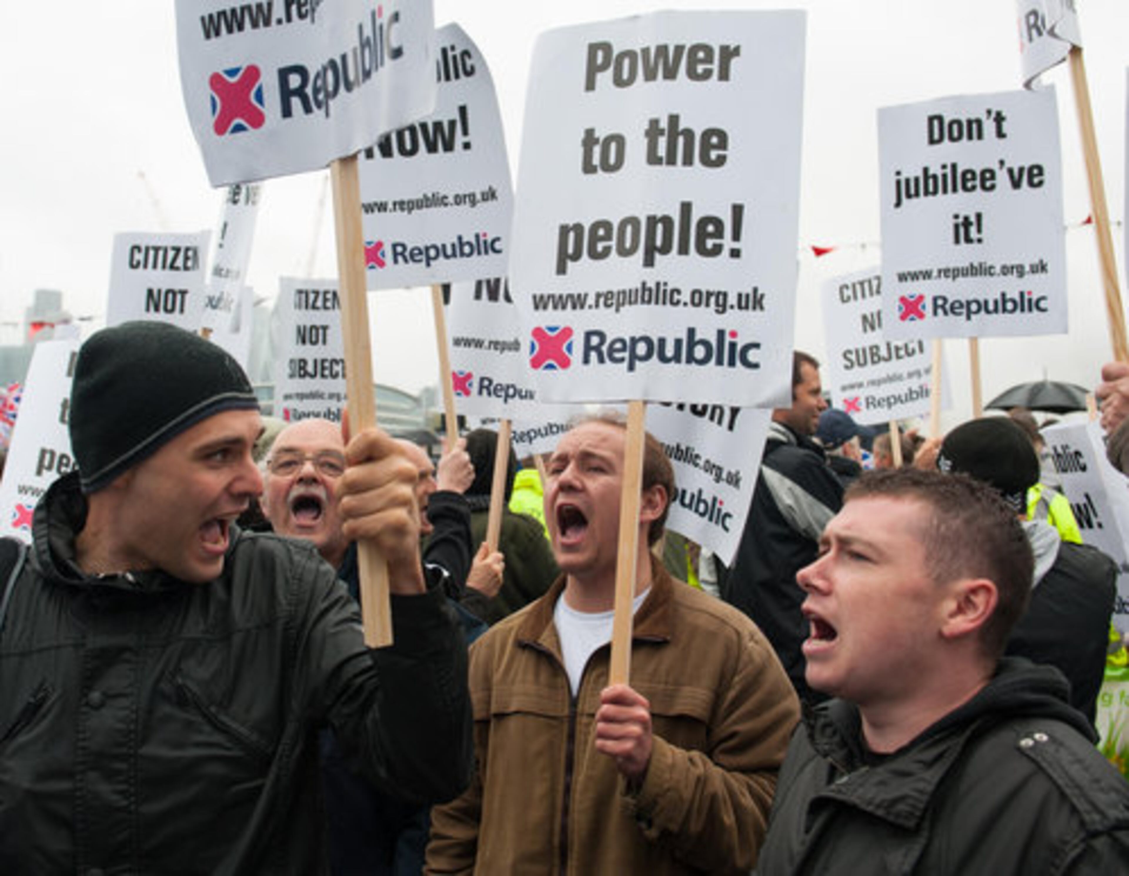 Members of an anti-monarchist group demonstrate near Tower Bridge, in central London, during the Diamond Jubilee celebrations Sunday June 3, 2012. Campaign group Republic said supporters from across the country will descend on the capital on Sunday for the "biggest and boldest anti-monarchy protest of modern times" as Queen Elizabeth takes part in a river flotilla, marking her 60 years on the British throne.